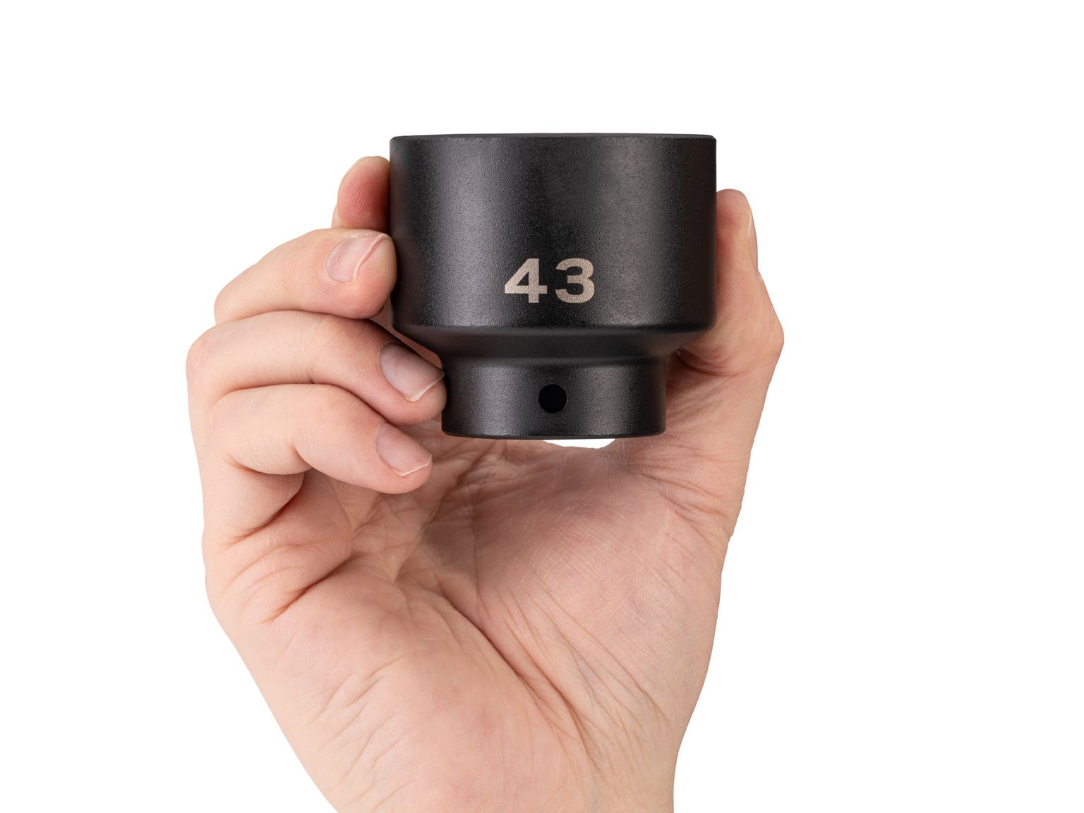 Person holding Tekton 43 millimeter impact drive 6-point socket. Item #SID22143
