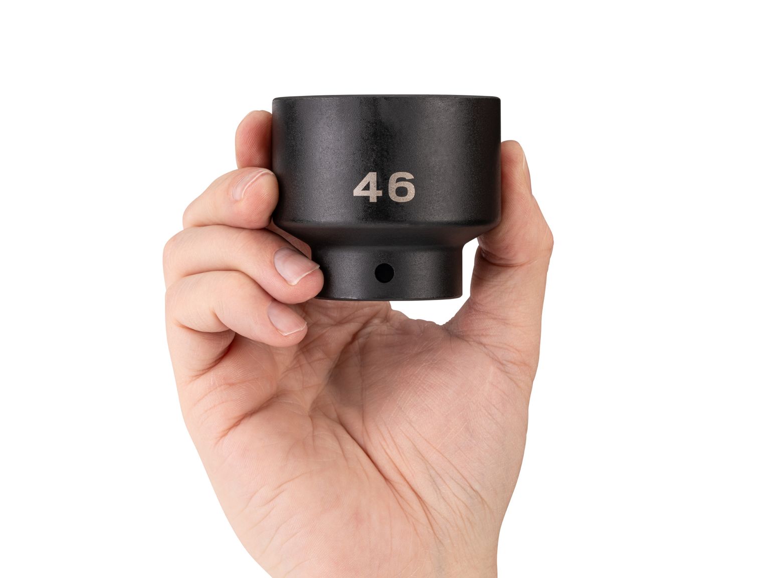 Person holding Tekton 46 millimeter impact drive 6-point socket. Item #SID22146