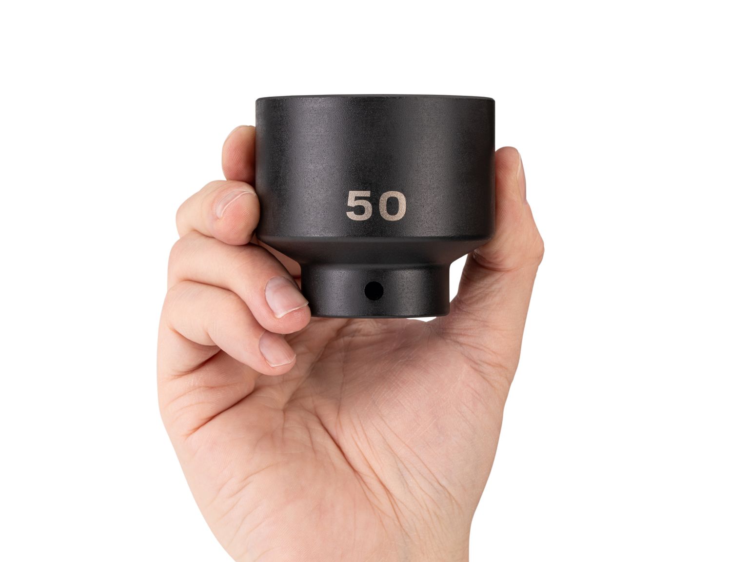 Person holding Tekton 50 millimeter impact drive 6-point socket. Item #SID22150