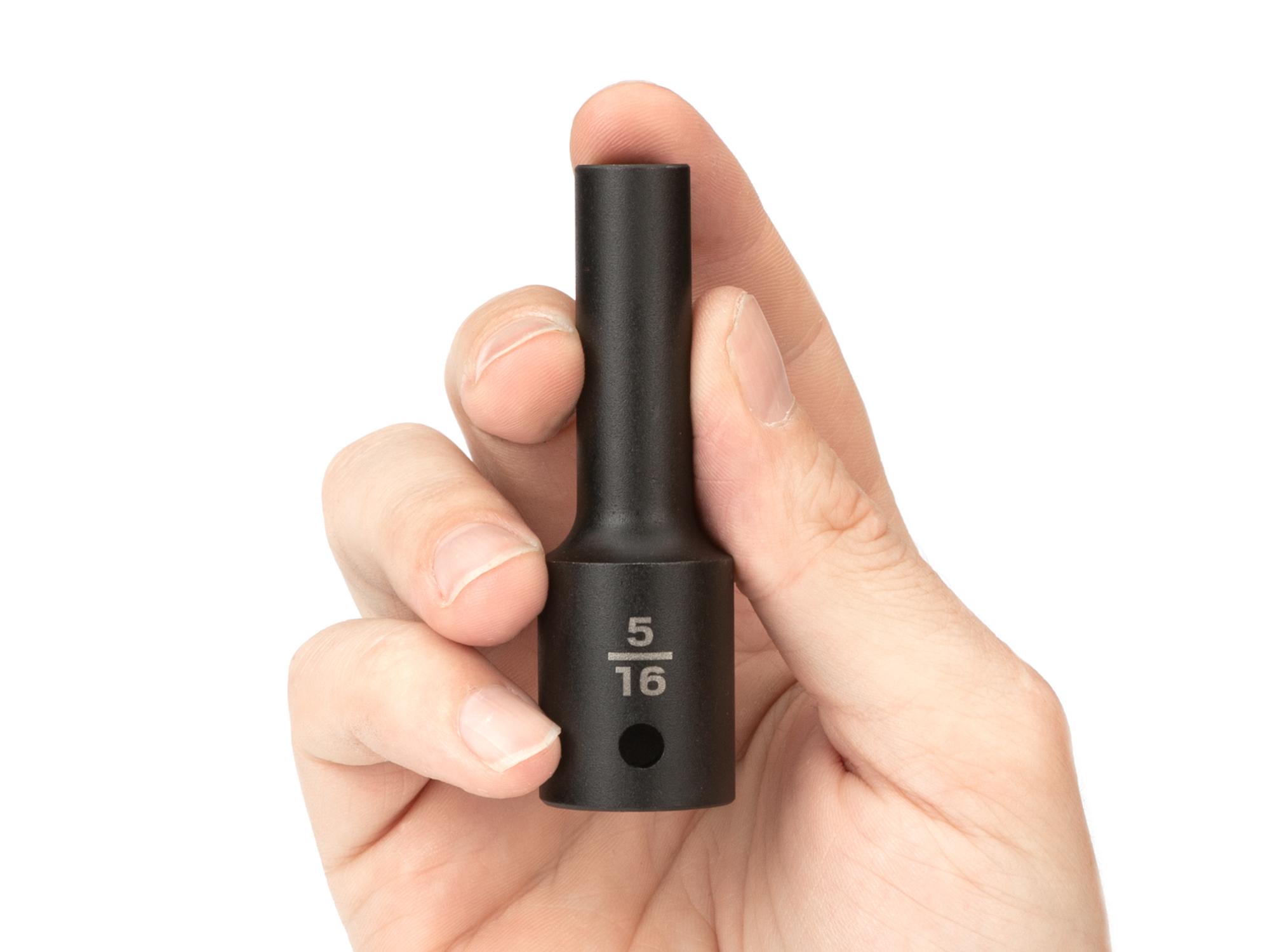 Person holding Tekton impact drive 6-point socket. Item #SID23008