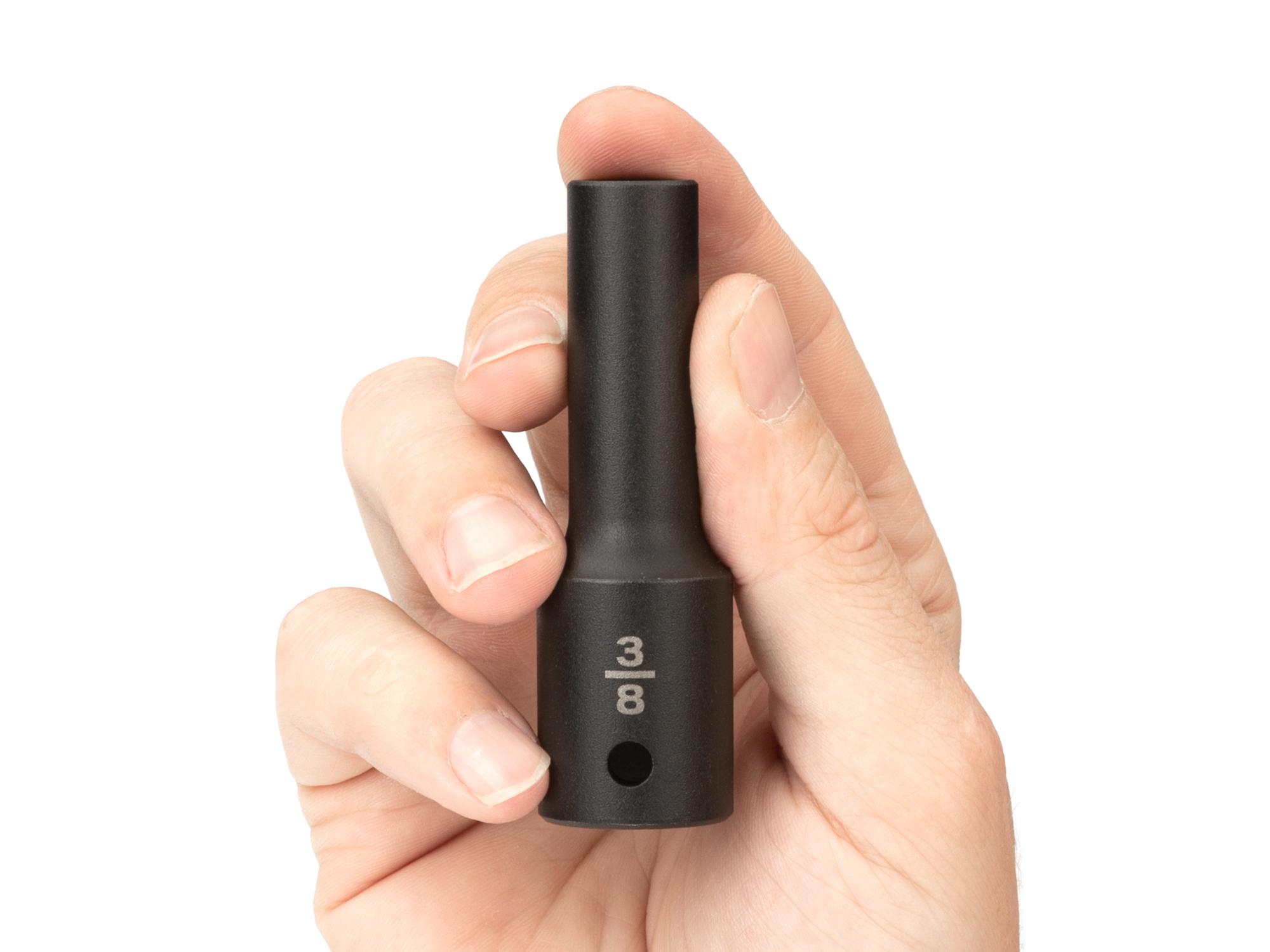Person holding Tekton impact drive 6-point socket. Item #SID23010