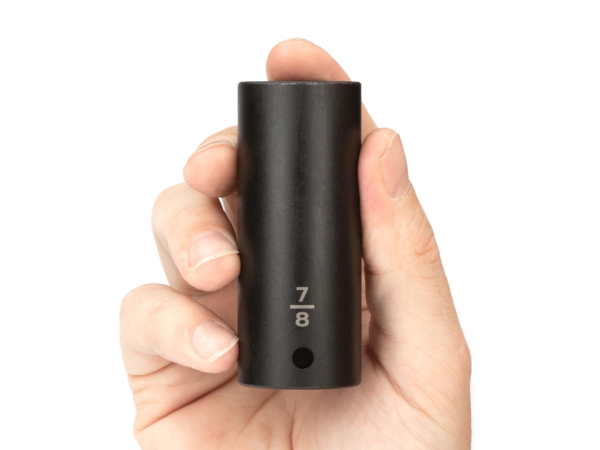 Person holding Tekton impact drive 6-point socket. Item #SID23022