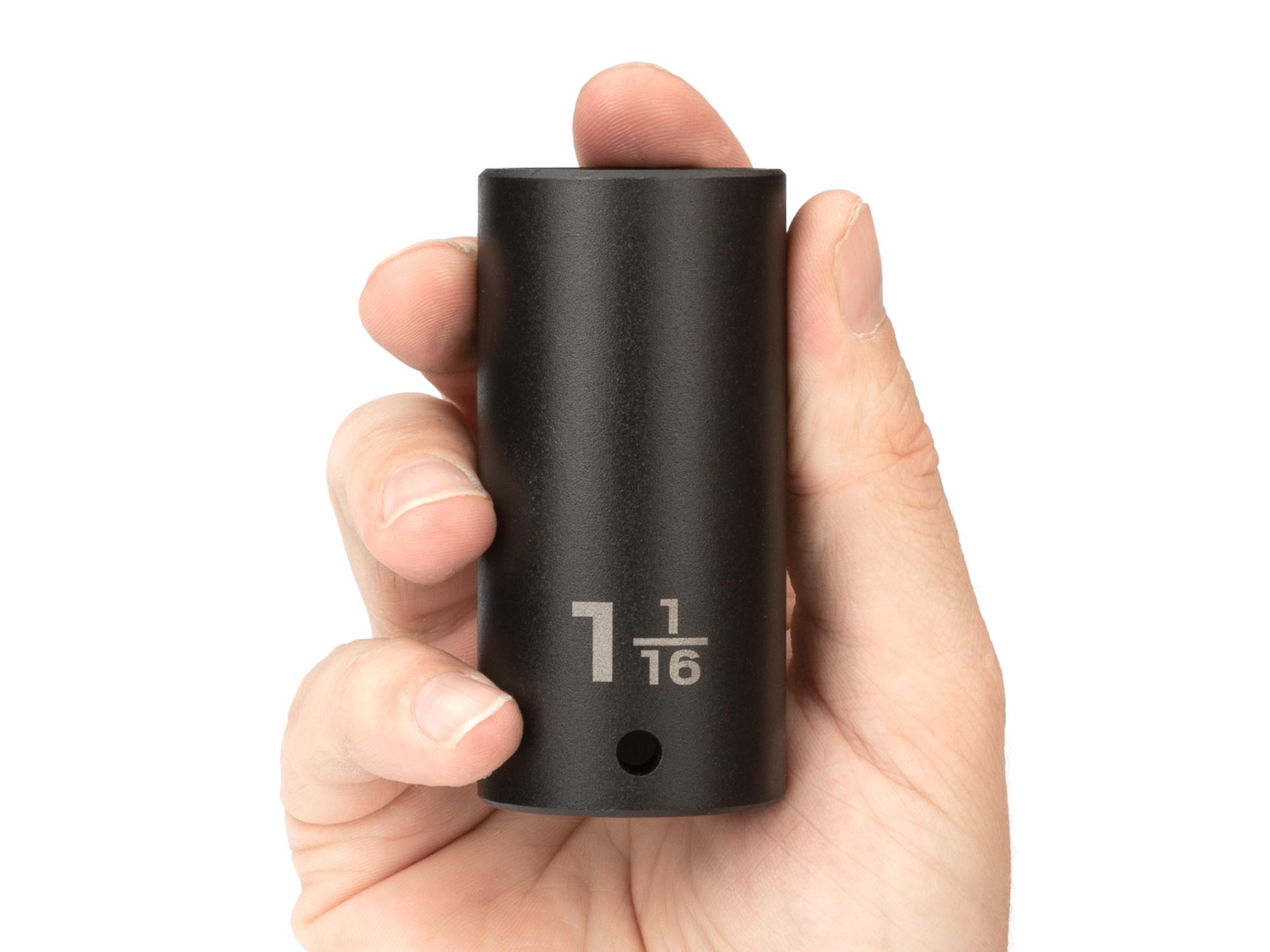 Person holding Tekton impact drive 6-point socket. Item #SID23027