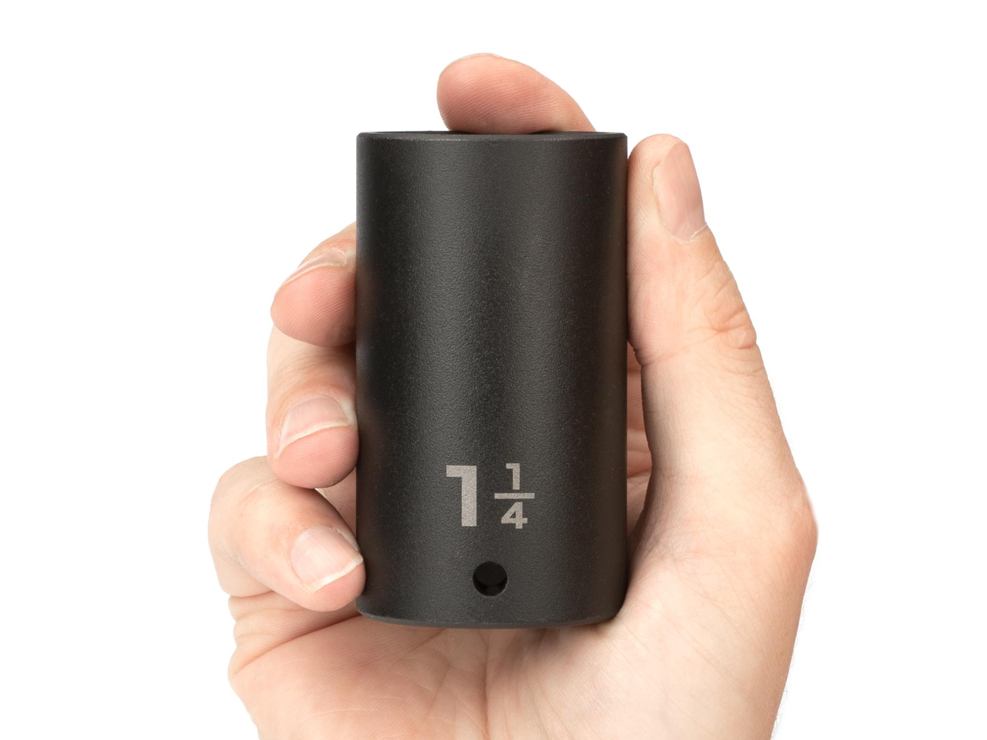 Person holding Tekton impact drive 6-point socket. Item #SID23032