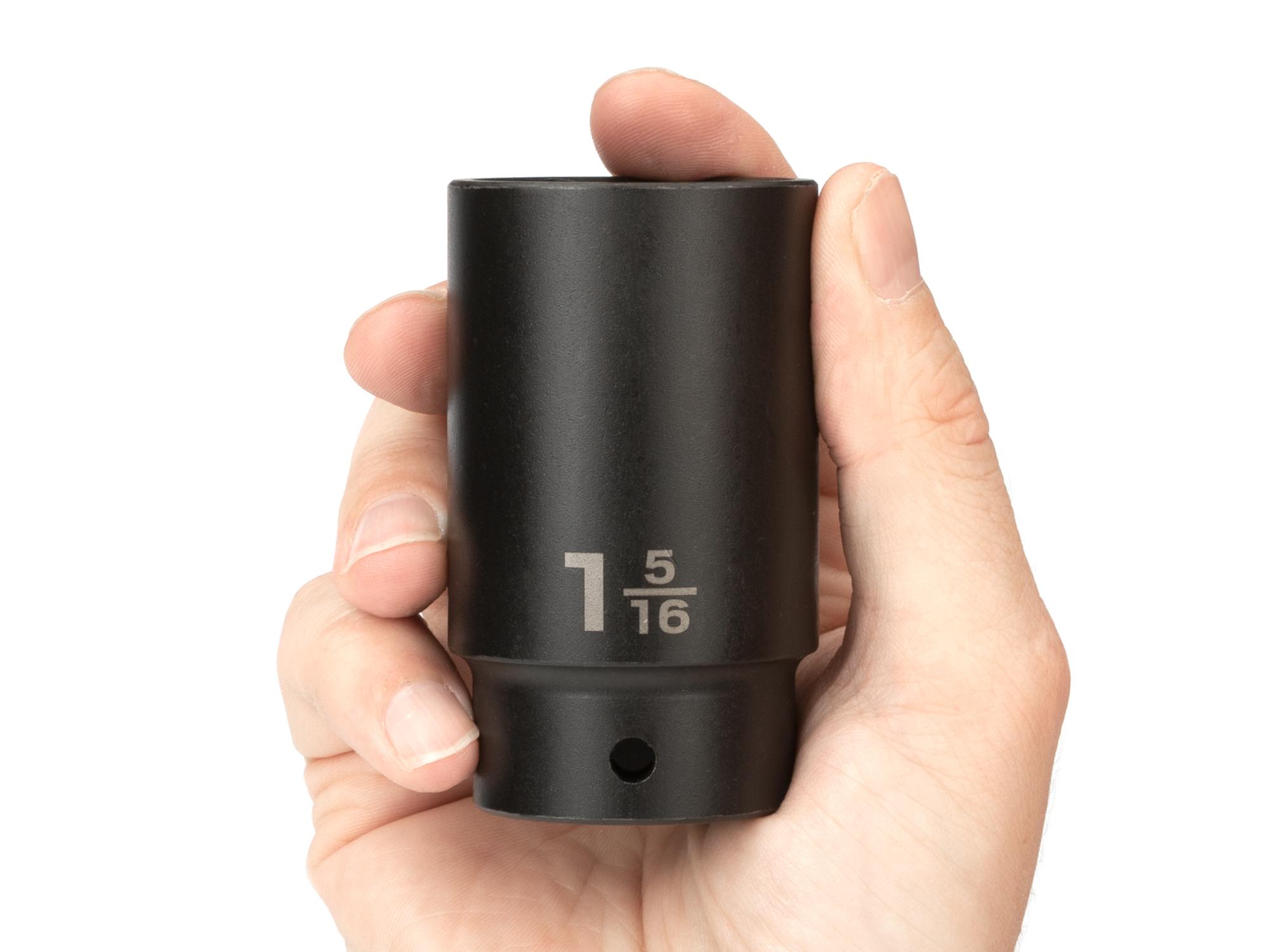 Person holding Tekton impact drive 6-point socket. Item #SID23033