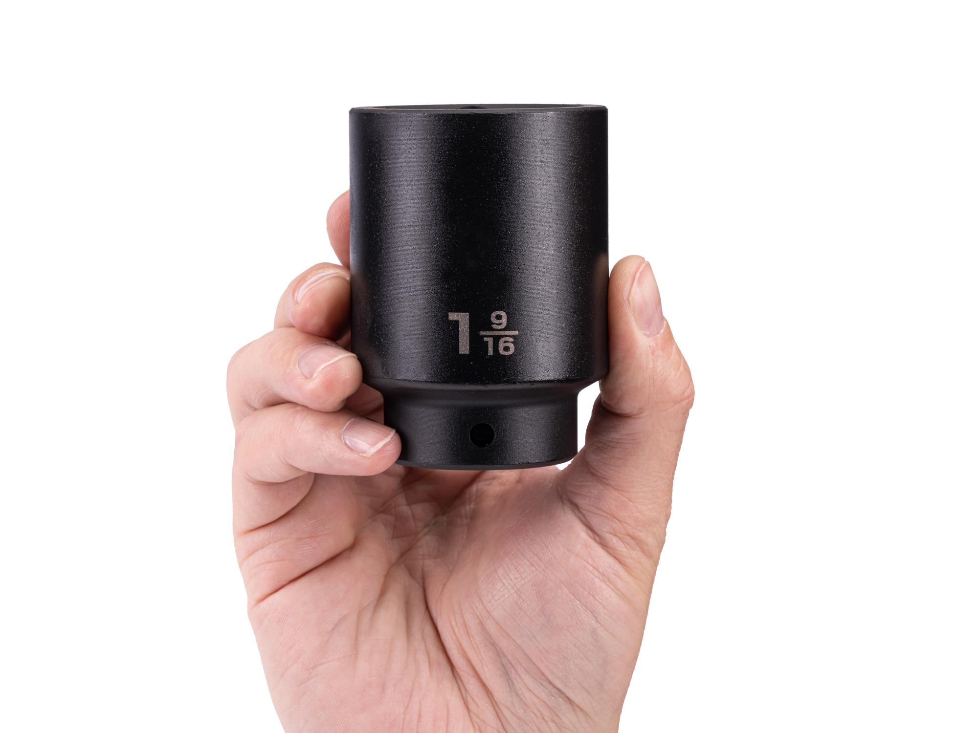 Person holding Tekton impact drive 6-point socket. Item #SID23040