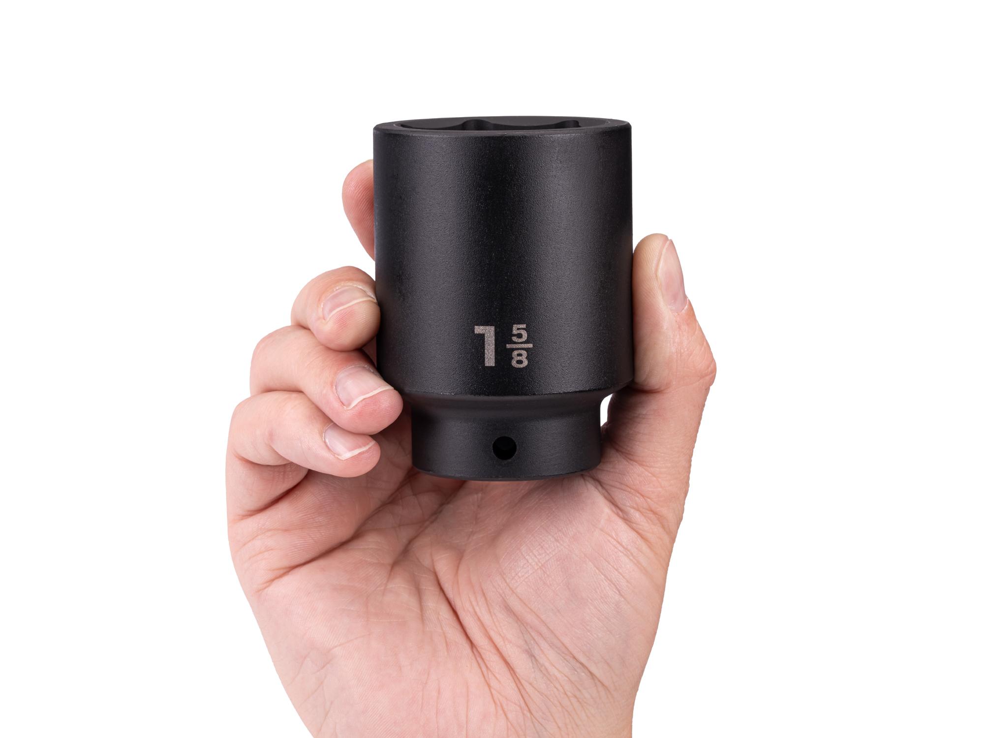 Person holding Tekton impact drive 6-point socket. Item #SID23041