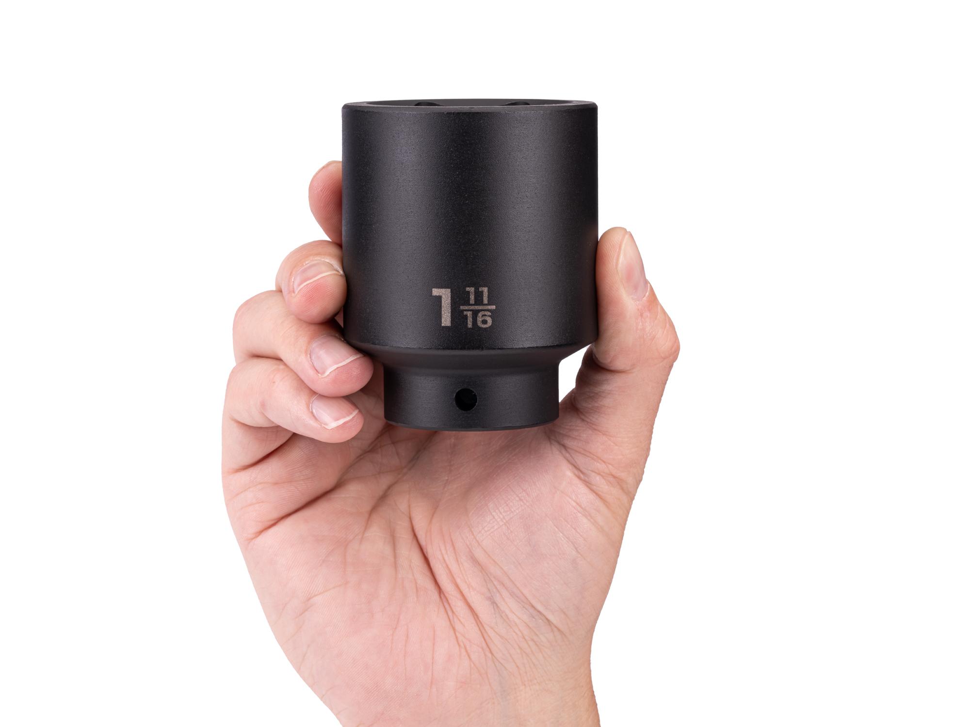 Person holding Tekton impact drive 6-point socket. Item #SID23043