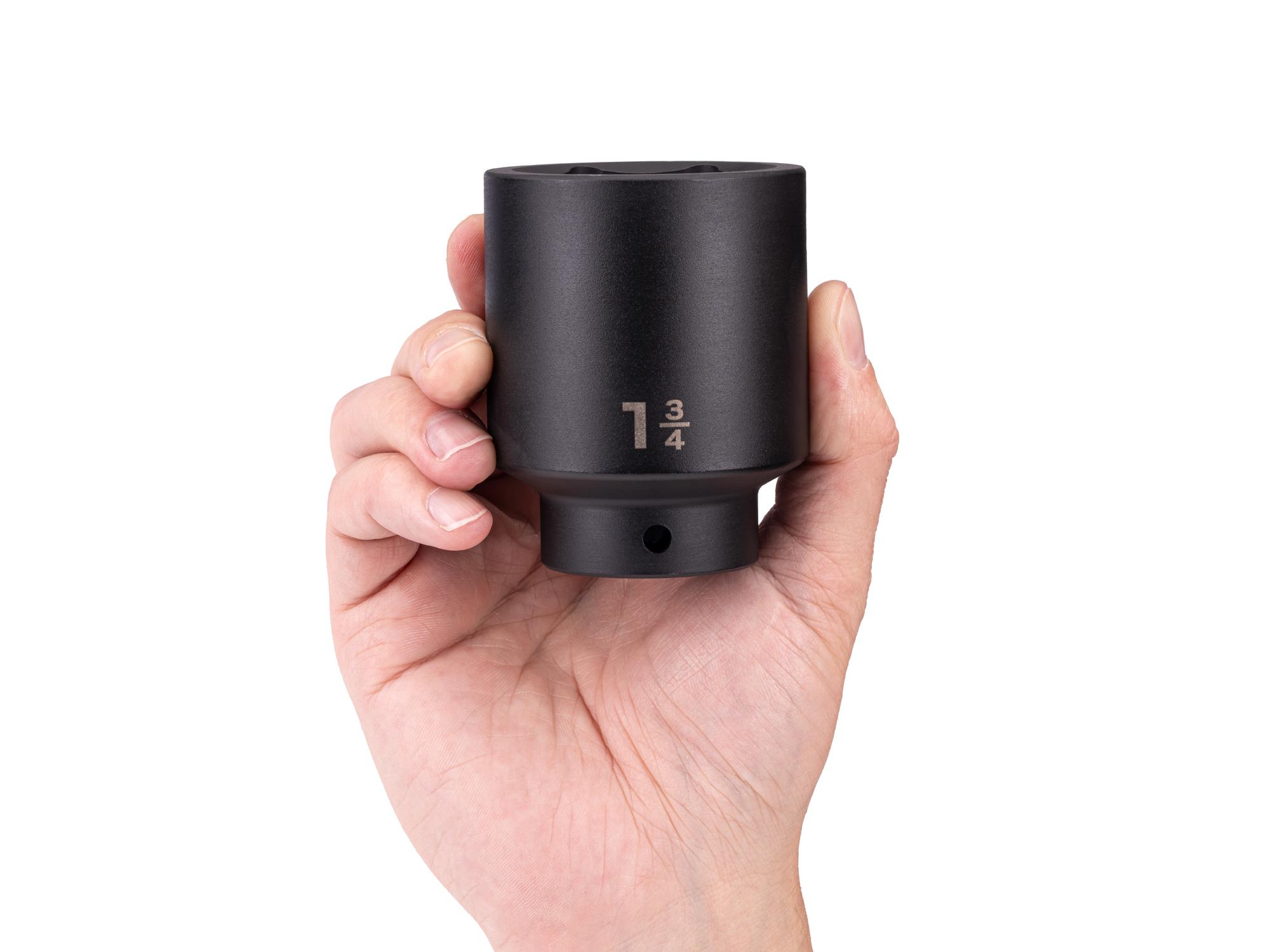 Person holding Tekton impact drive 6-point socket. Item #SID23045