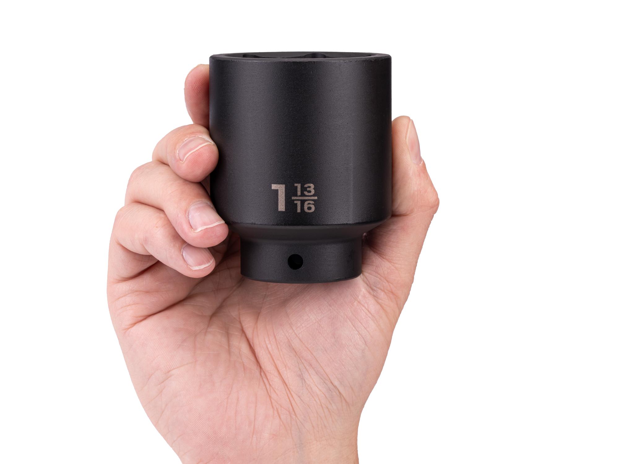 Person holding Tekton impact drive 6-point socket. Item #SID23046