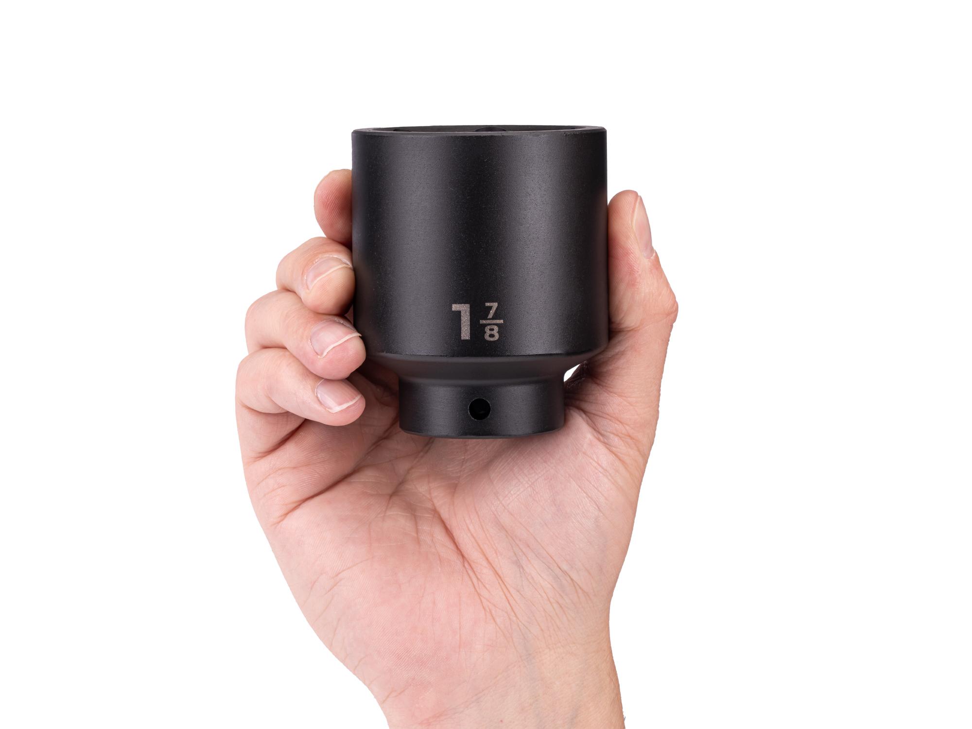 Person holding Tekton impact drive 6-point socket. Item #SID23048