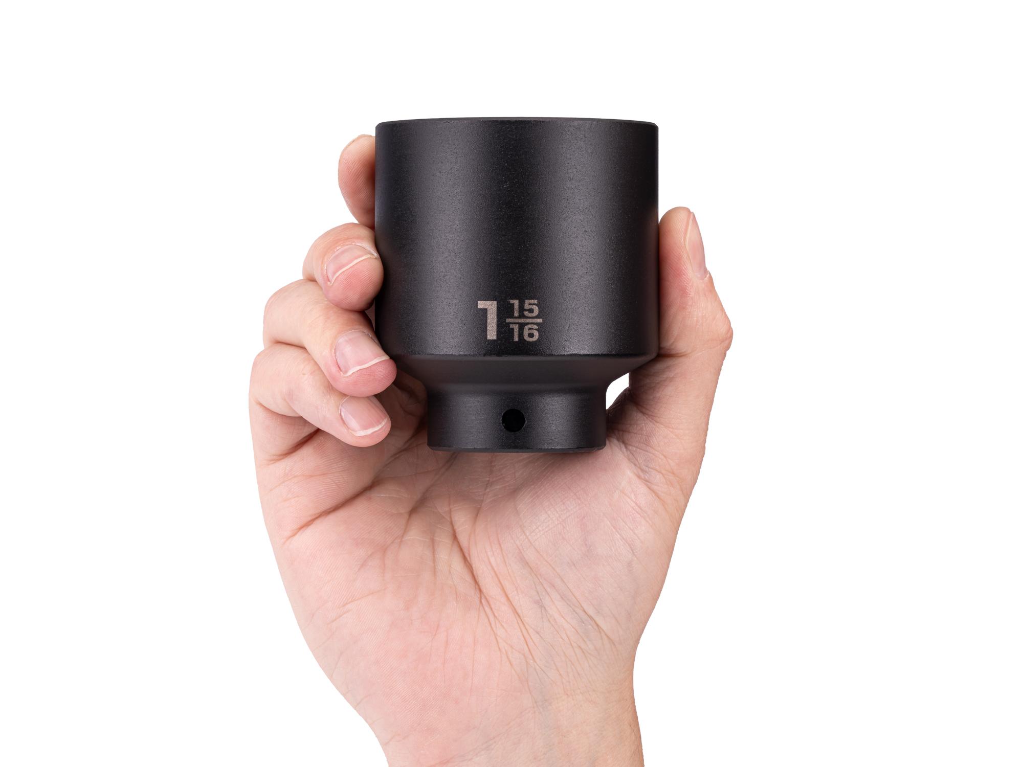Person holding Tekton impact drive 6-point socket. Item #SID23049