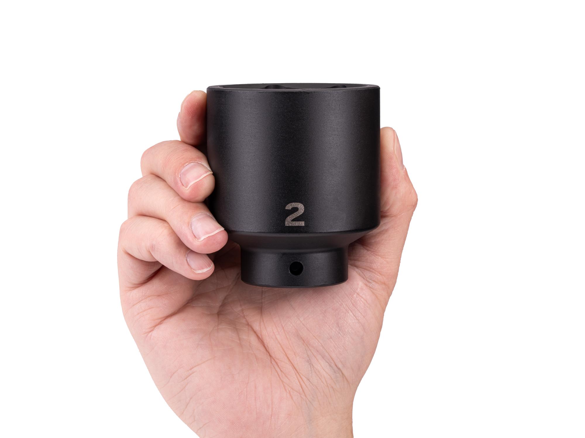 Person holding Tekton impact drive 6-point socket. Item #SID23051