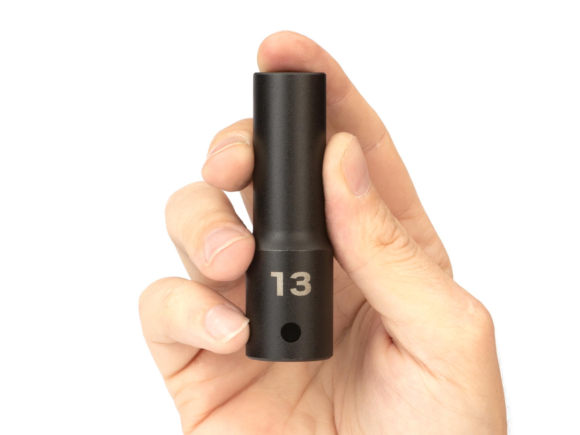 Person holding Tekton impact drive 6-point socket. Item #SID23113