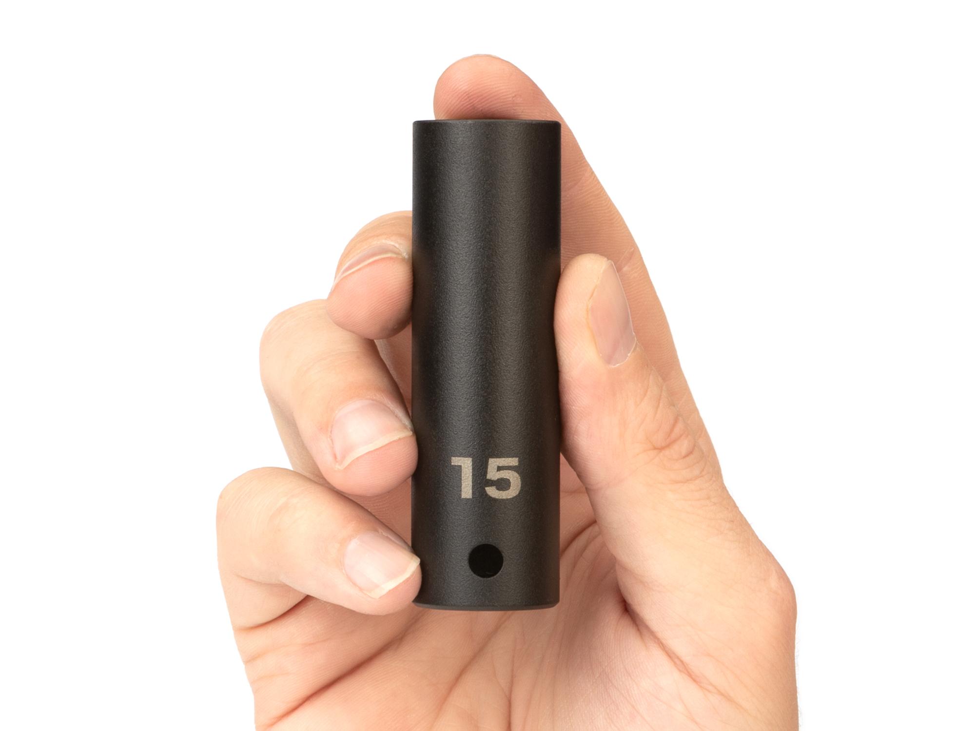 Person holding Tekton impact drive 6-point socket. Item #SID23115