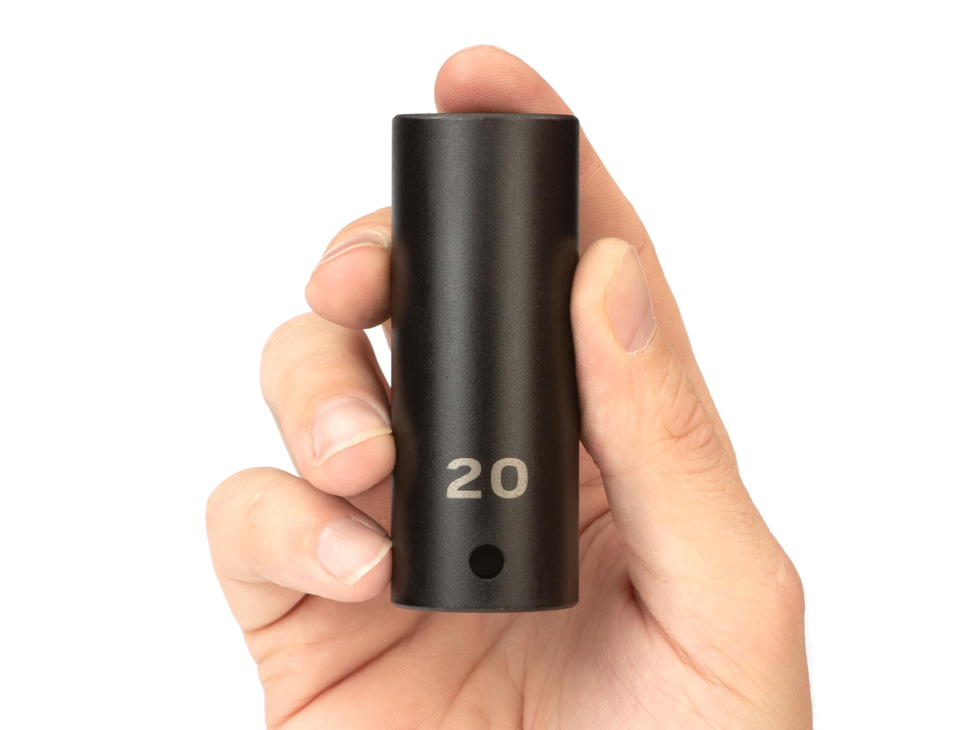 Person holding Tekton impact drive 6-point socket. Item #SID23120