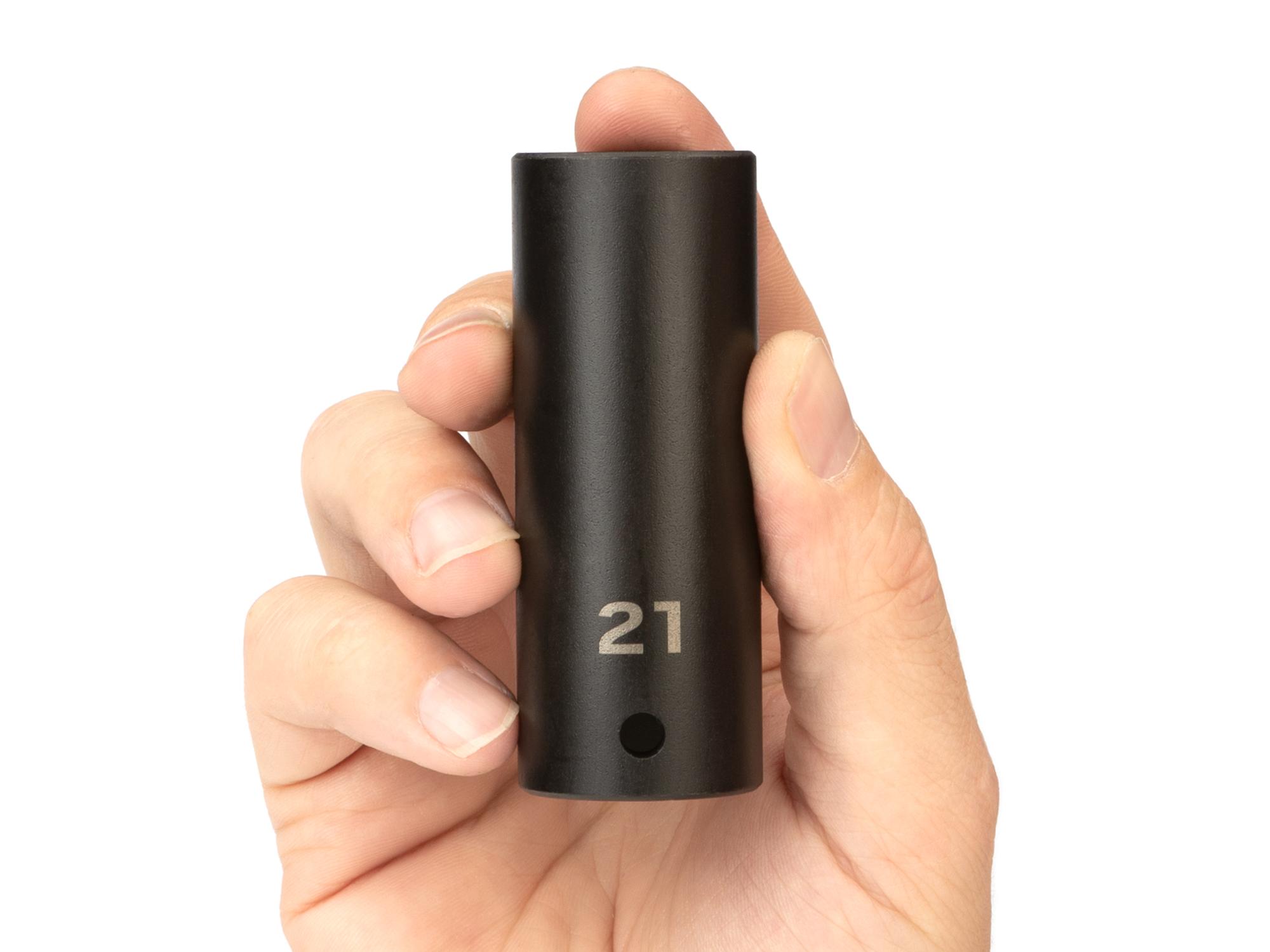 Person holding Tekton impact drive 6-point socket. Item #SID23121