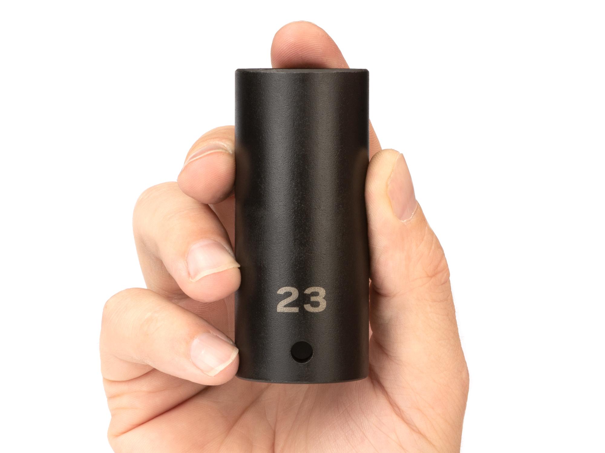 Person holding Tekton impact drive 6-point socket. Item #SID23123