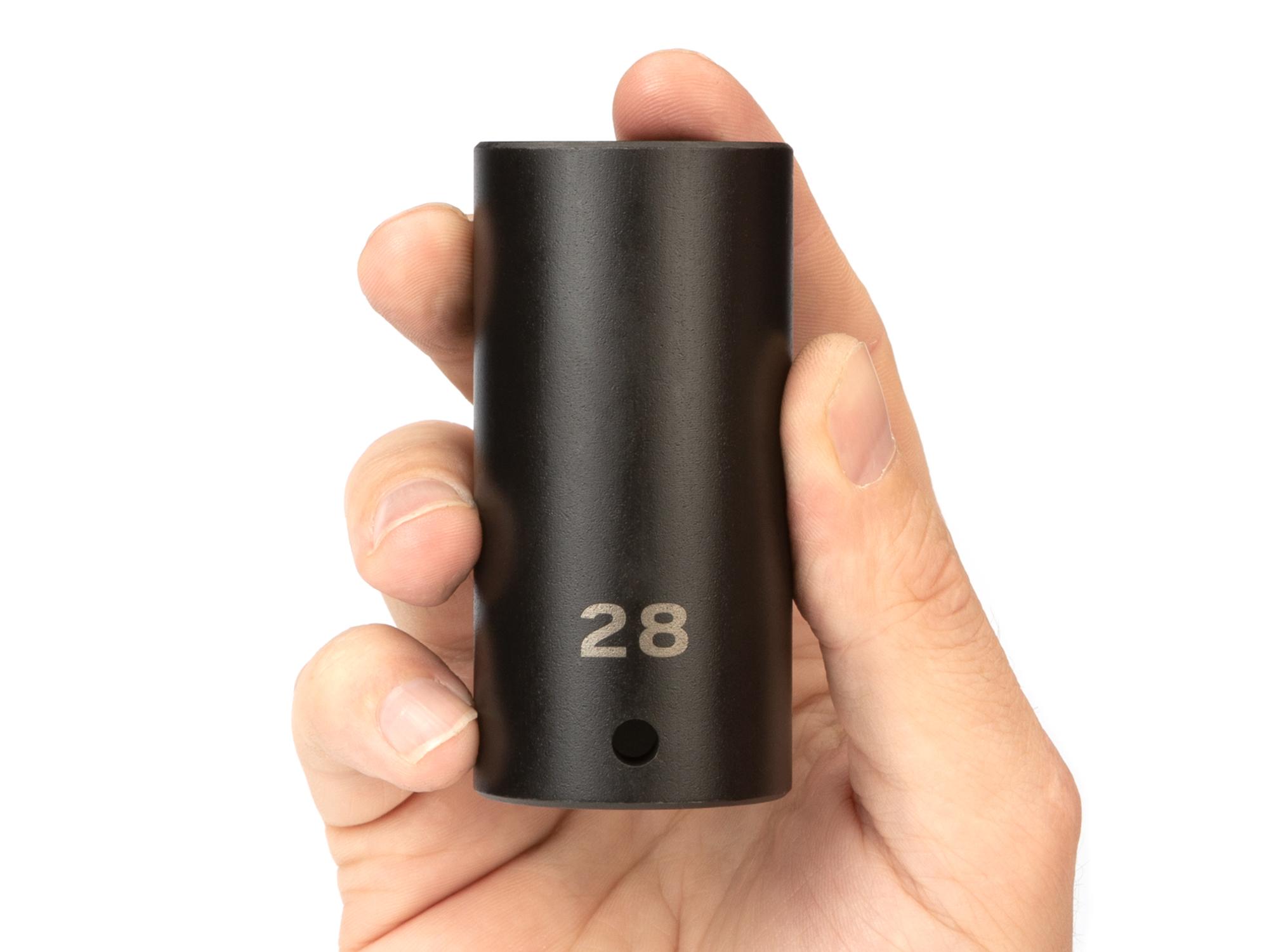 Person holding Tekton impact drive 6-point socket. Item #SID23128
