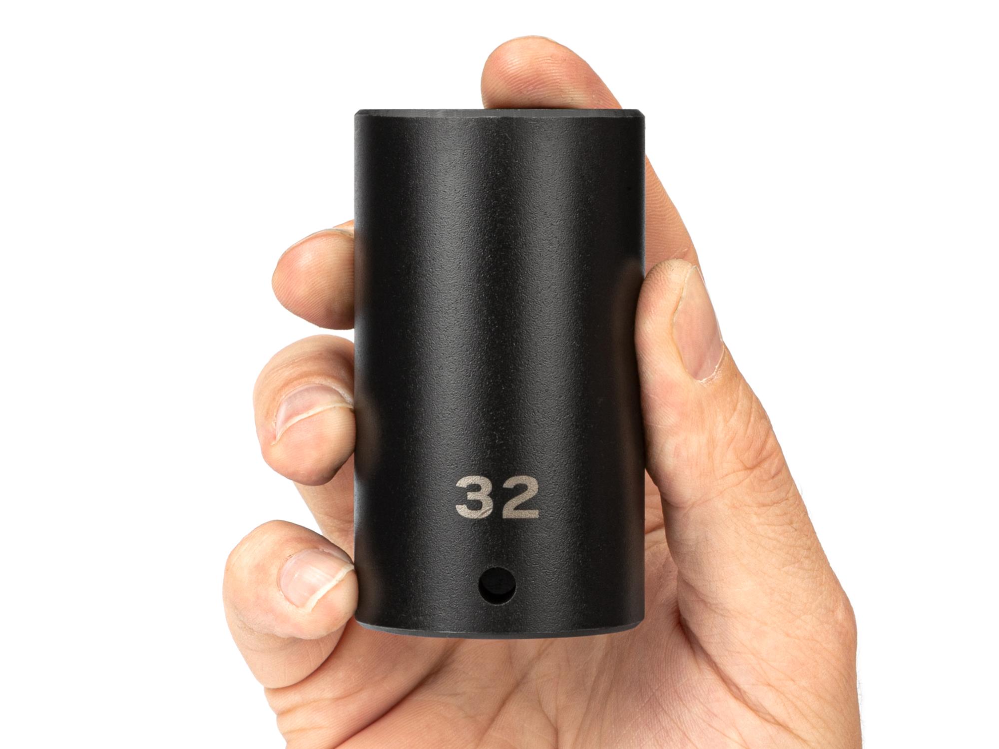 Person holding Tekton impact drive 6-point socket. Item #SID23132