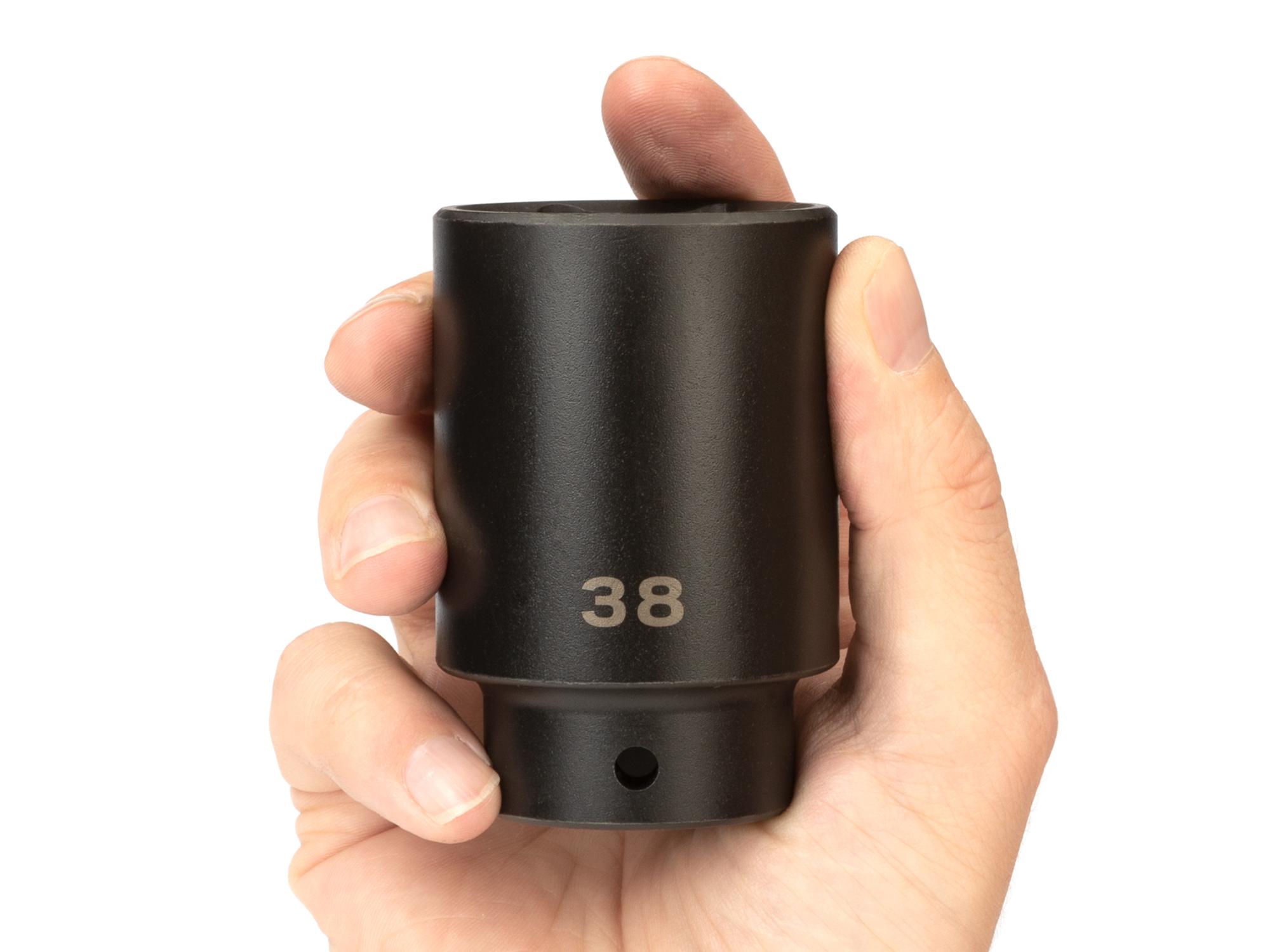 Person holding Tekton impact drive 6-point socket. Item #SID23138