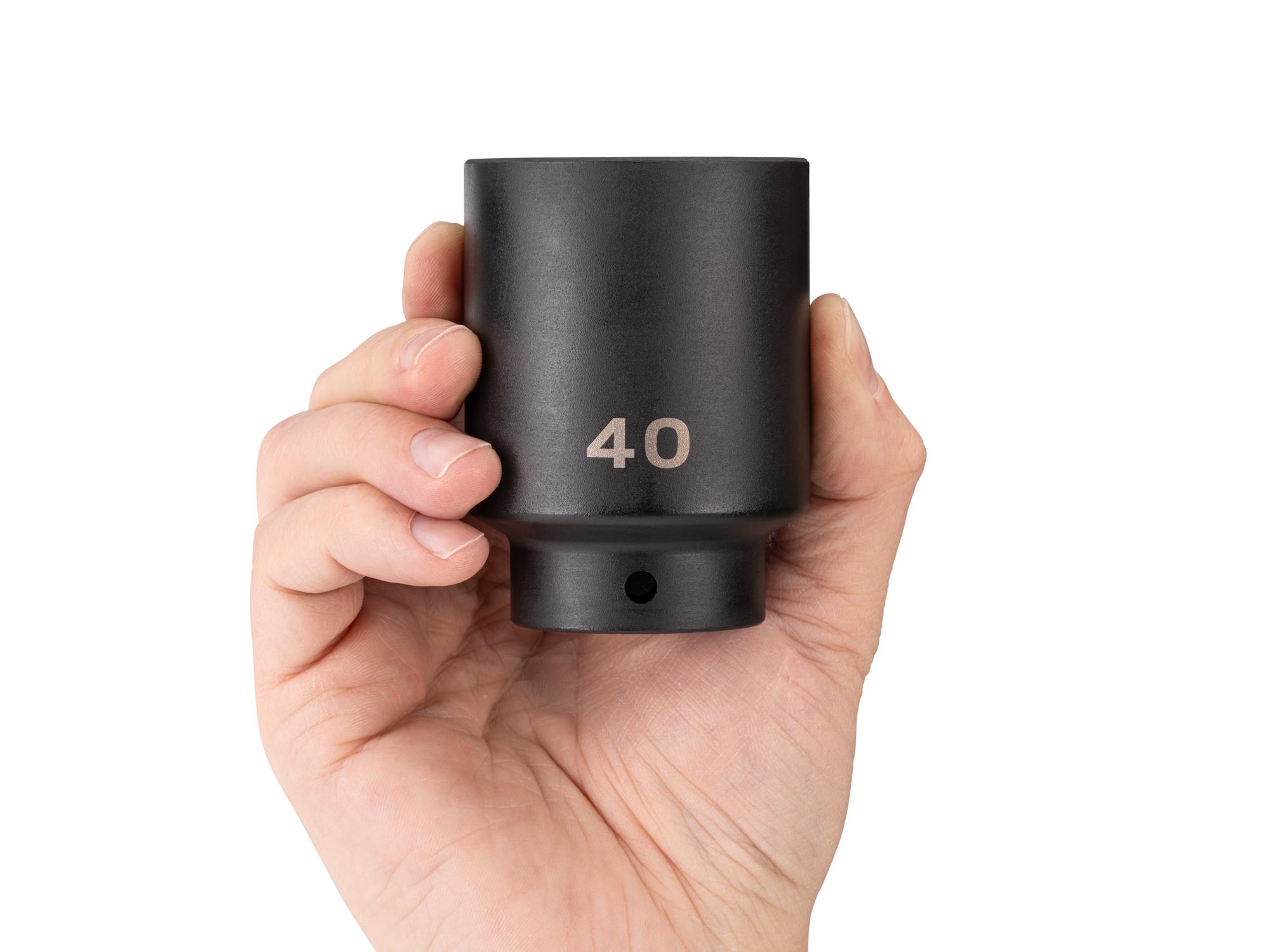 Person holding Tekton impact drive 6-point socket. Item #SID23140