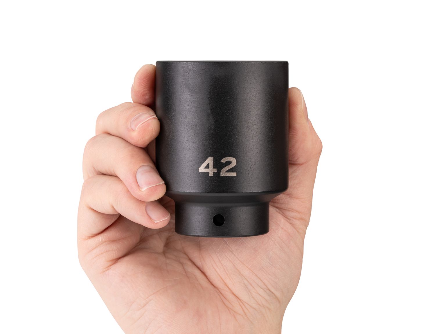 Person holding Tekton 42 millimeter impact drive 6-point socket. Item #SID23142