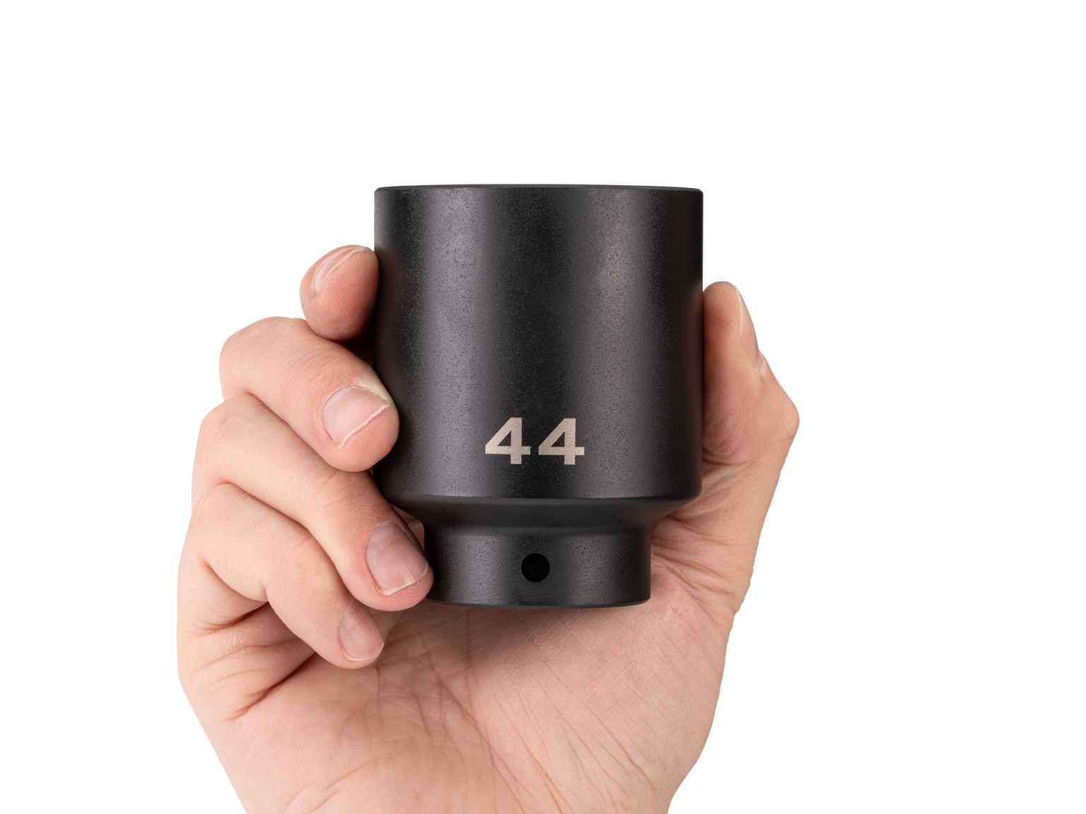 Person holding Tekton 44 millimeter impact drive 6-point socket. Item #SID23144