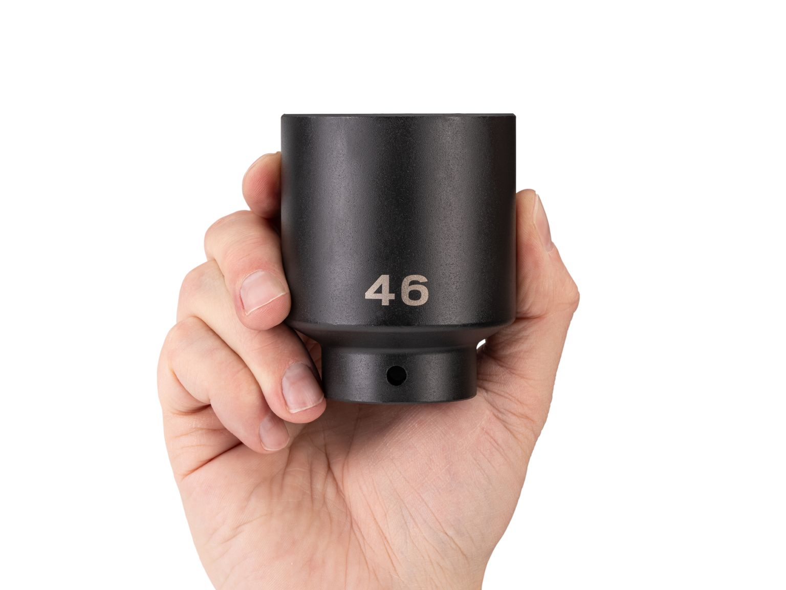 Person holding Tekton 46 millimeter impact drive 6-point socket. Item #SID23146