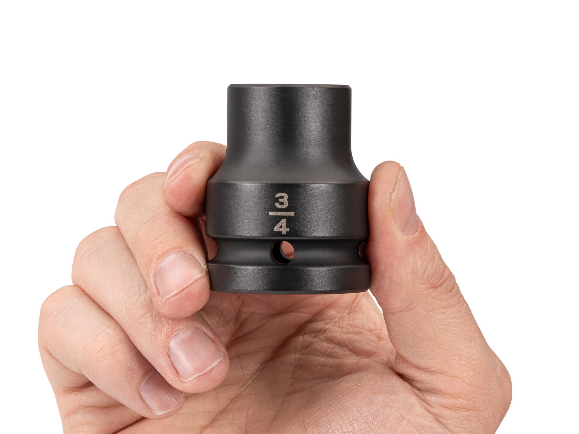 Person holding Tekton impact drive 6-point socket. Item #SID32019