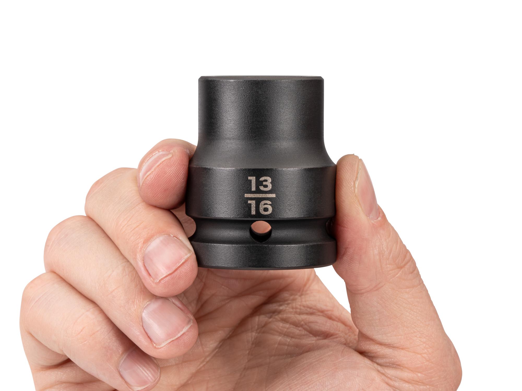 Person holding Tekton impact drive 6-point socket. Item #SID32021