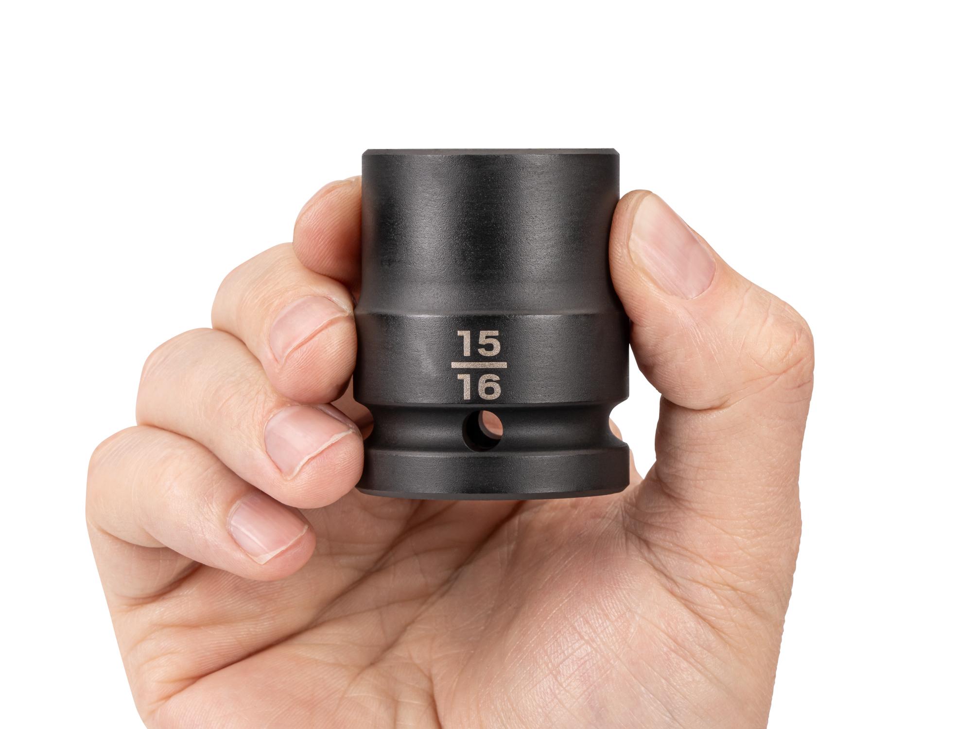 Person holding Tekton impact drive 6-point socket. Item #SID32024