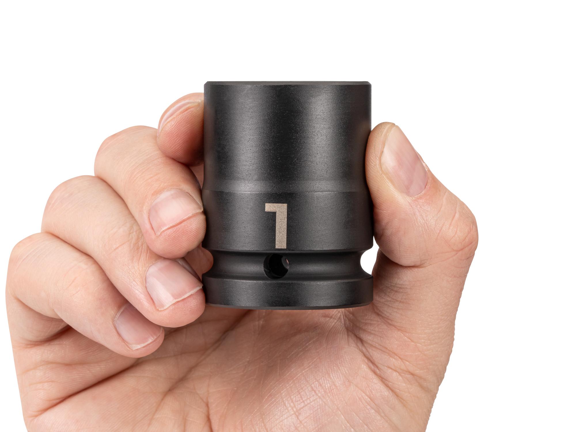 Person holding Tekton impact drive 6-point socket. Item #SID32025