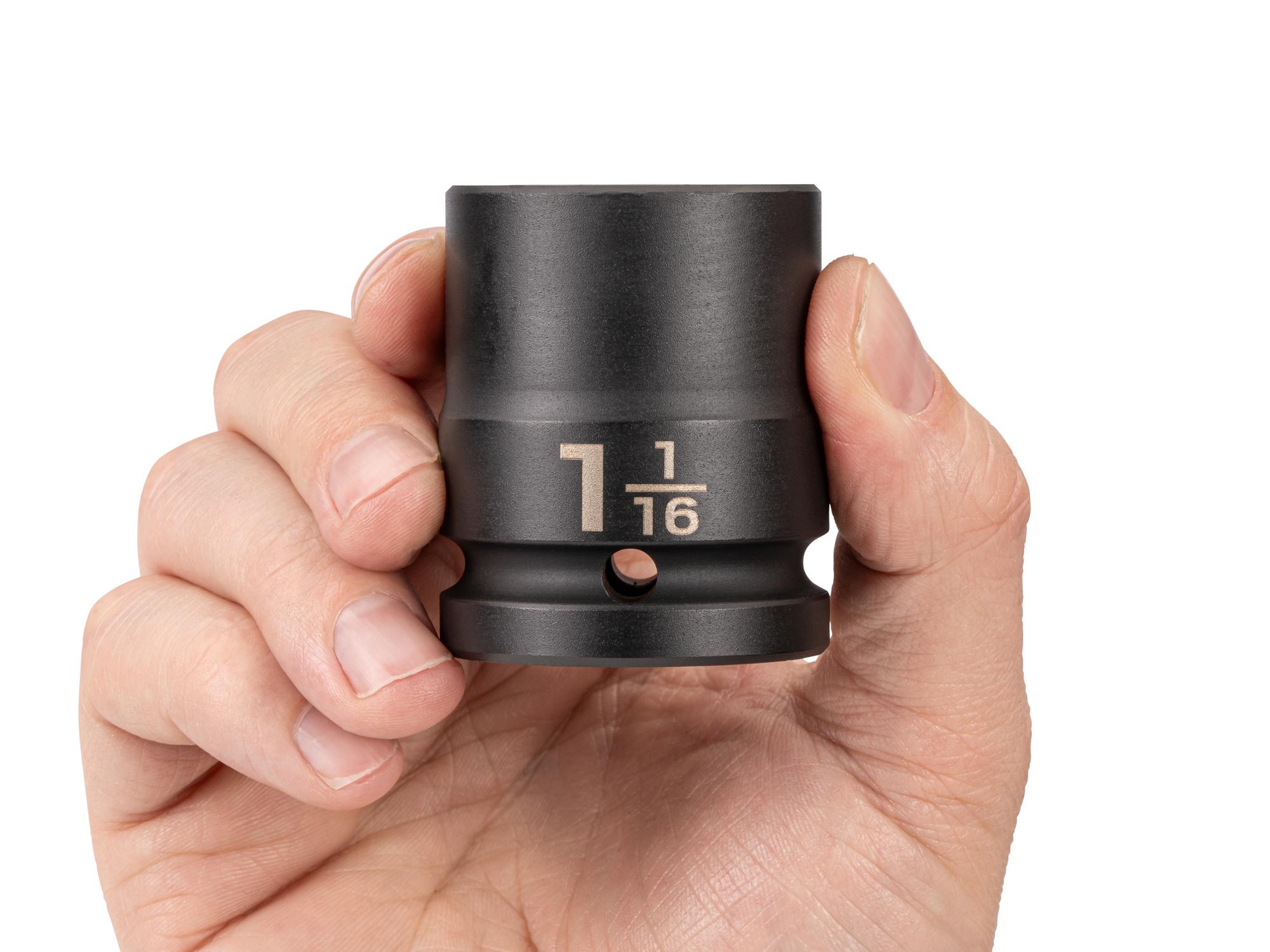 Person holding Tekton impact drive 6-point socket. Item #SID32027