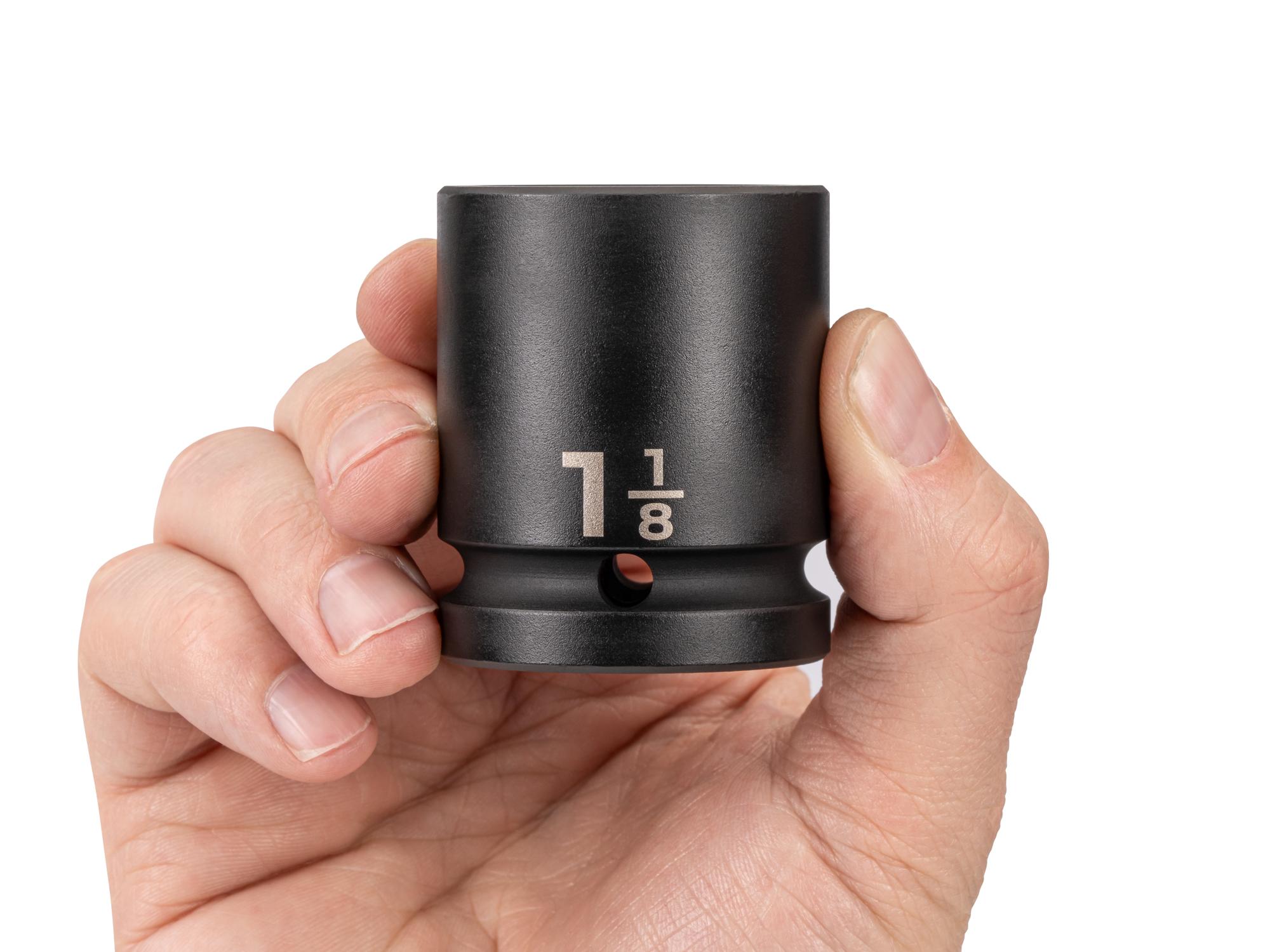 Person holding Tekton impact drive 6-point socket. Item #SID32029