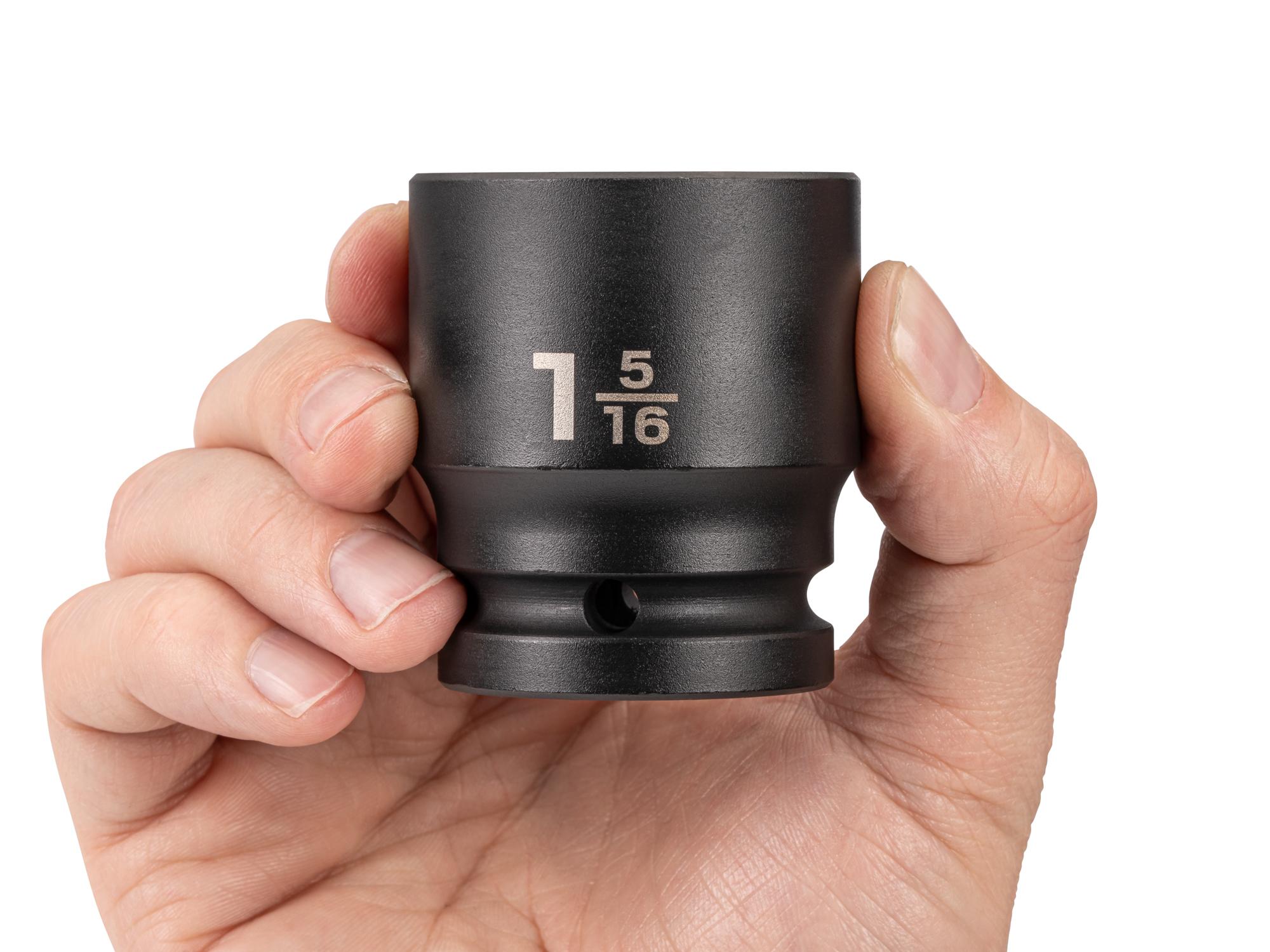 Person holding Tekton impact drive 6-point socket. Item #SID32033