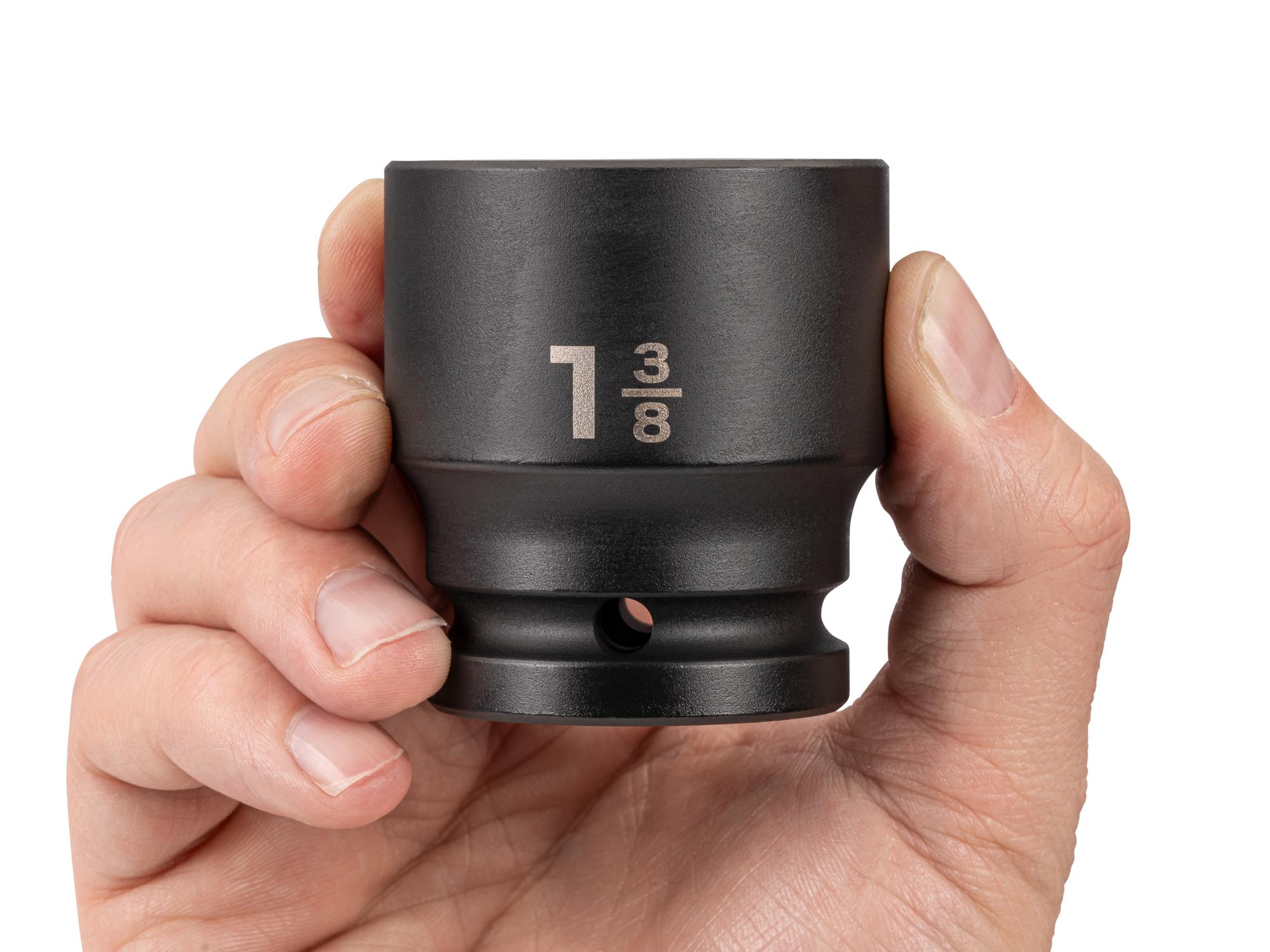 Person holding Tekton impact drive 6-point socket. Item #SID32035