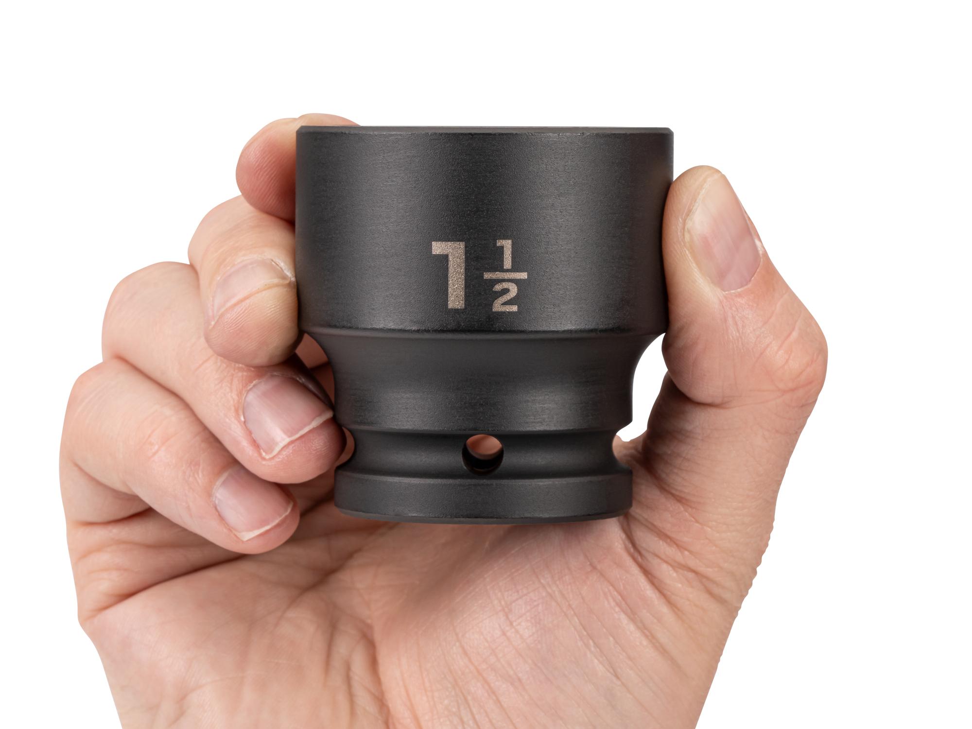 Person holding Tekton impact drive 6-point socket. Item #SID32038
