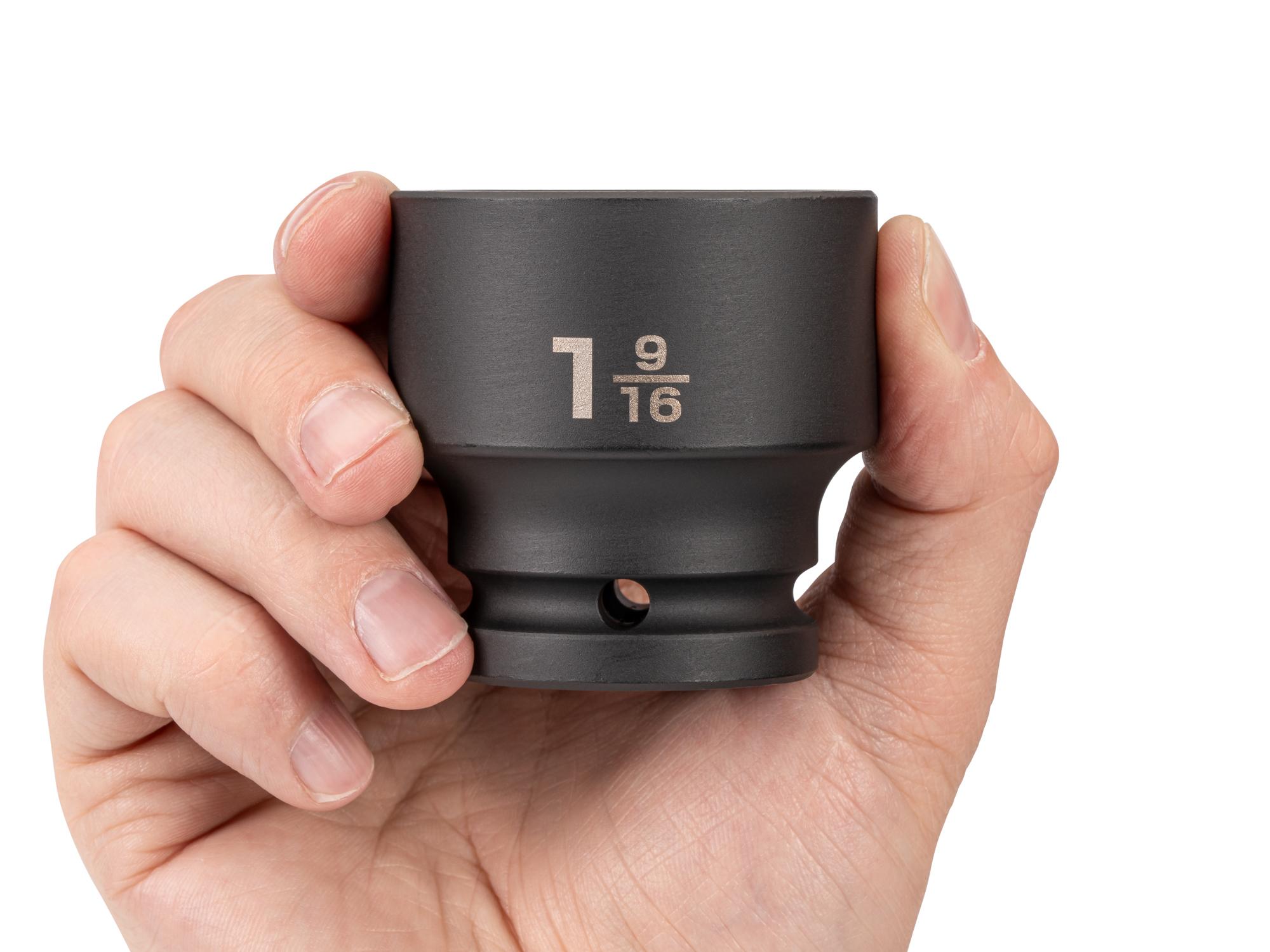 Person holding Tekton impact drive 6-point socket. Item #SID32040