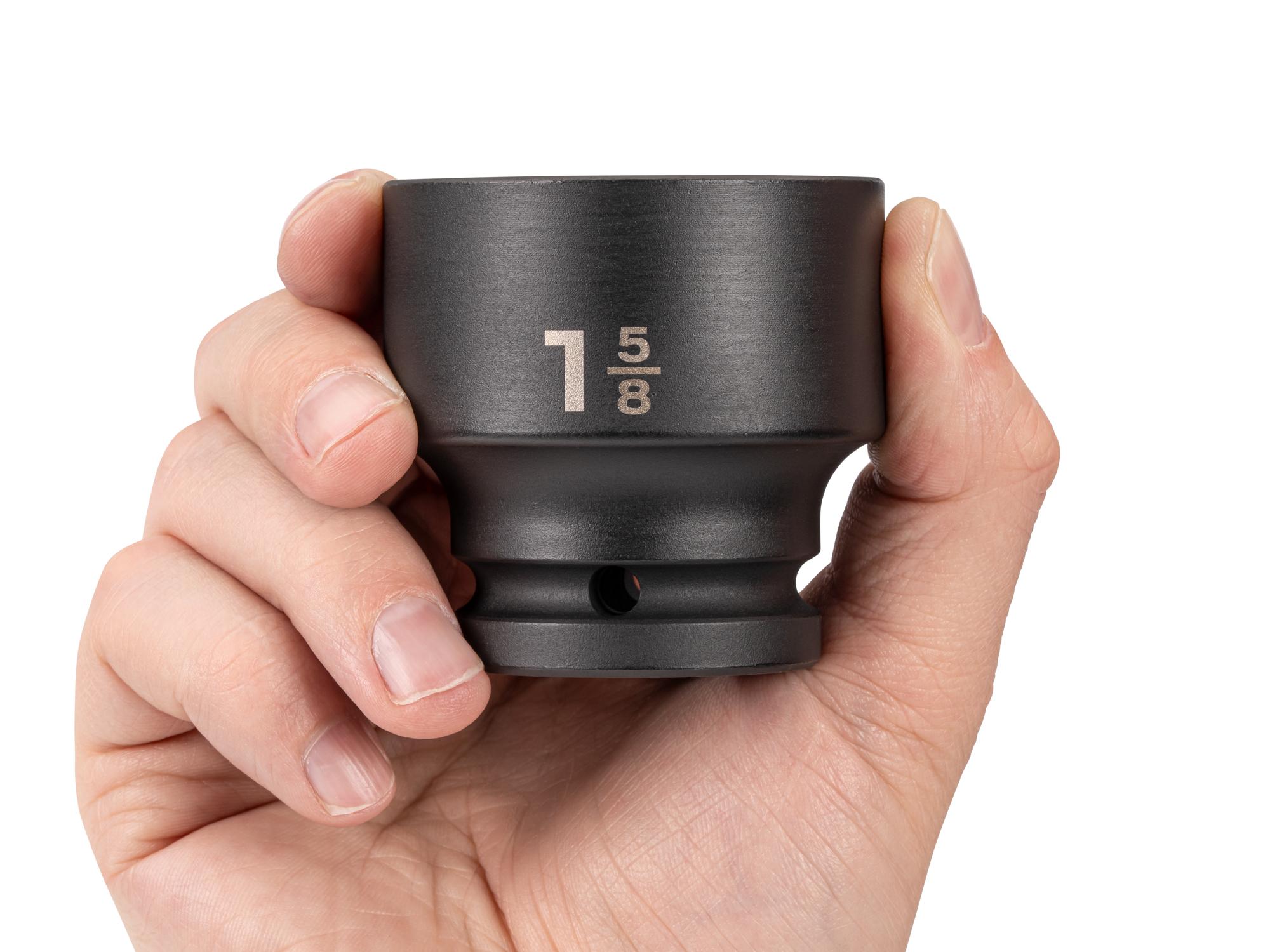 Person holding Tekton impact drive 6-point socket. Item #SID32041