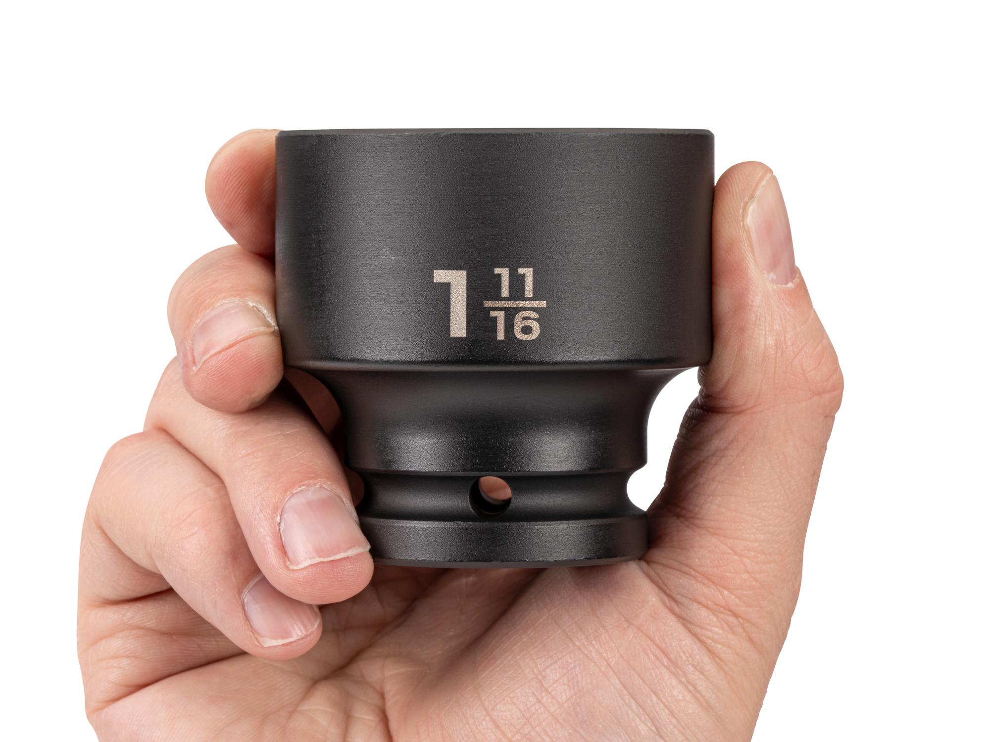 Person holding Tekton impact drive 6-point socket. Item #SID32043