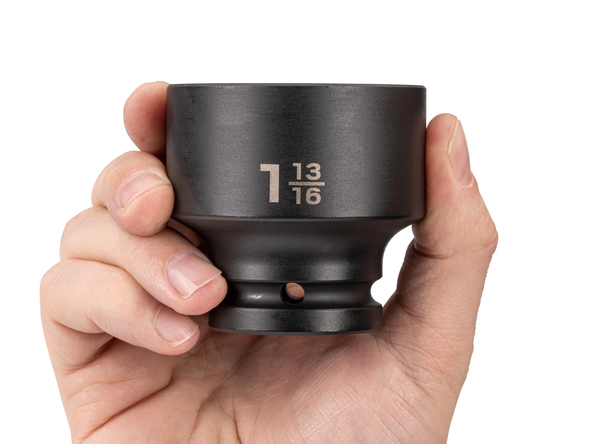 Person holding Tekton impact drive 6-point socket. Item #SID32046