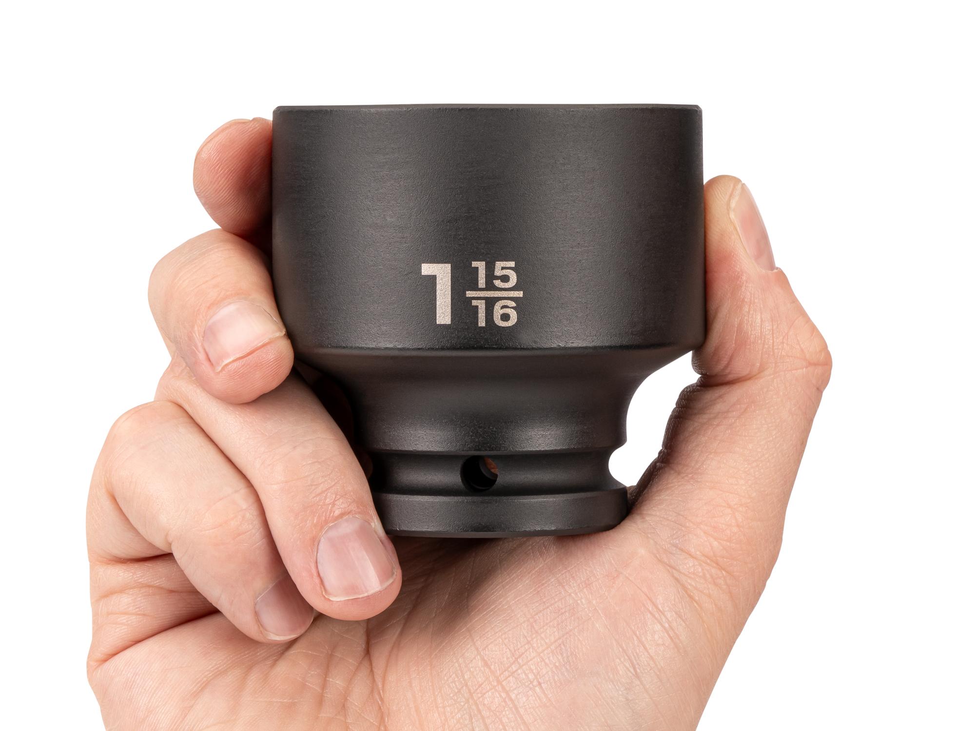 Person holding Tekton impact drive 6-point socket. Item #SID32049