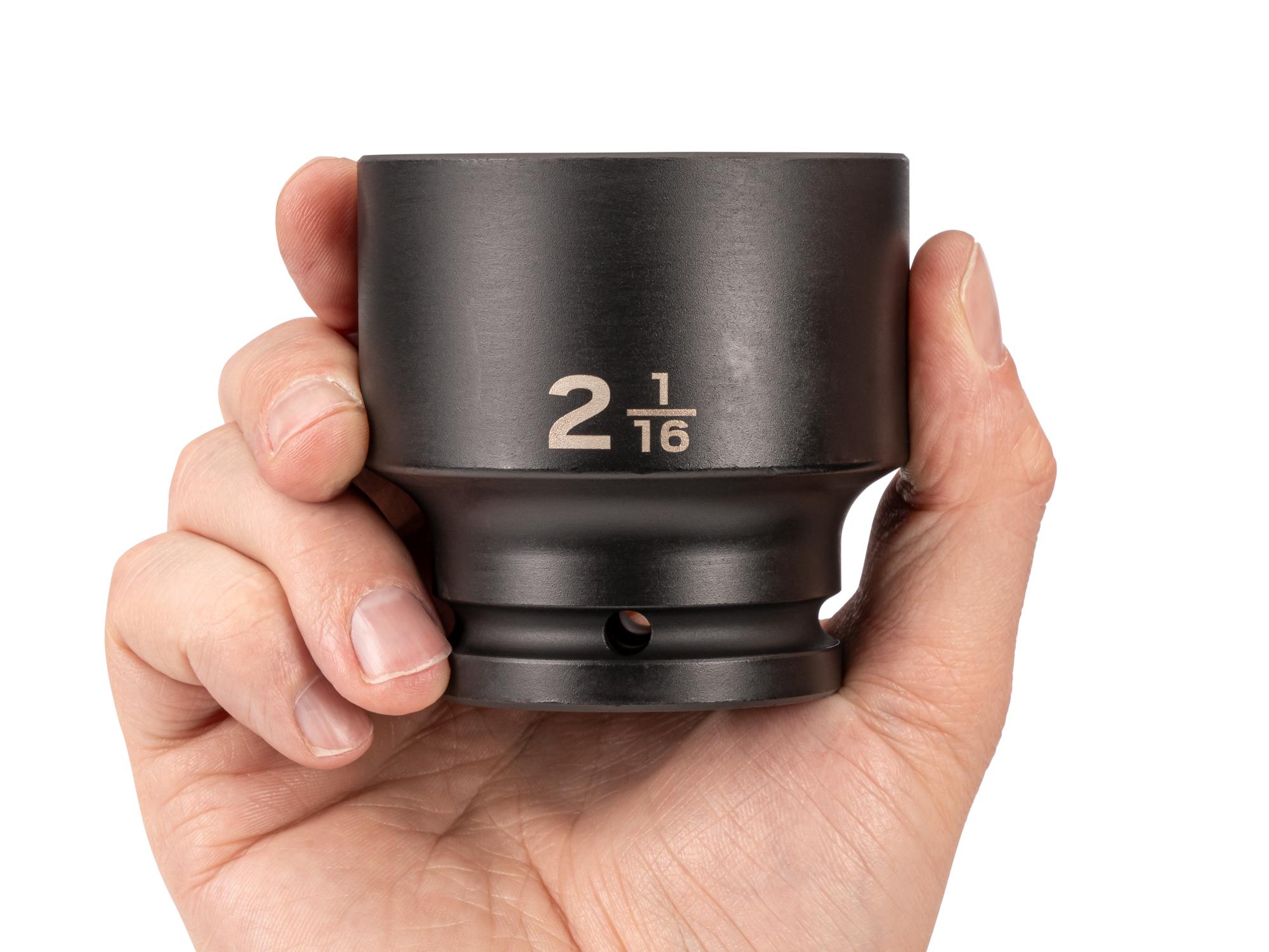 Person holding Tekton impact drive 6-point socket. Item #SID32052