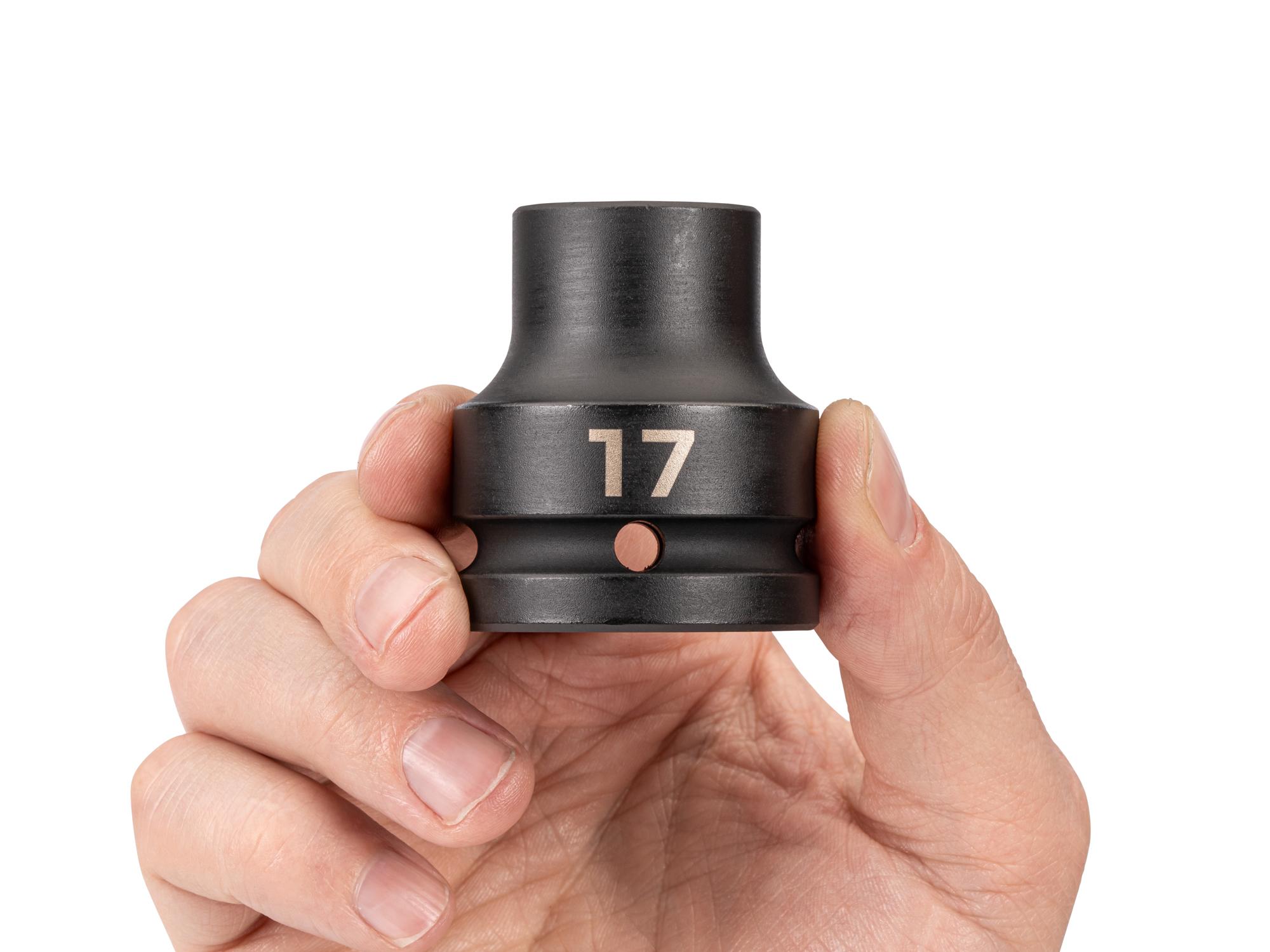 Person holding Tekton impact drive 6-point socket. Item #SID32117