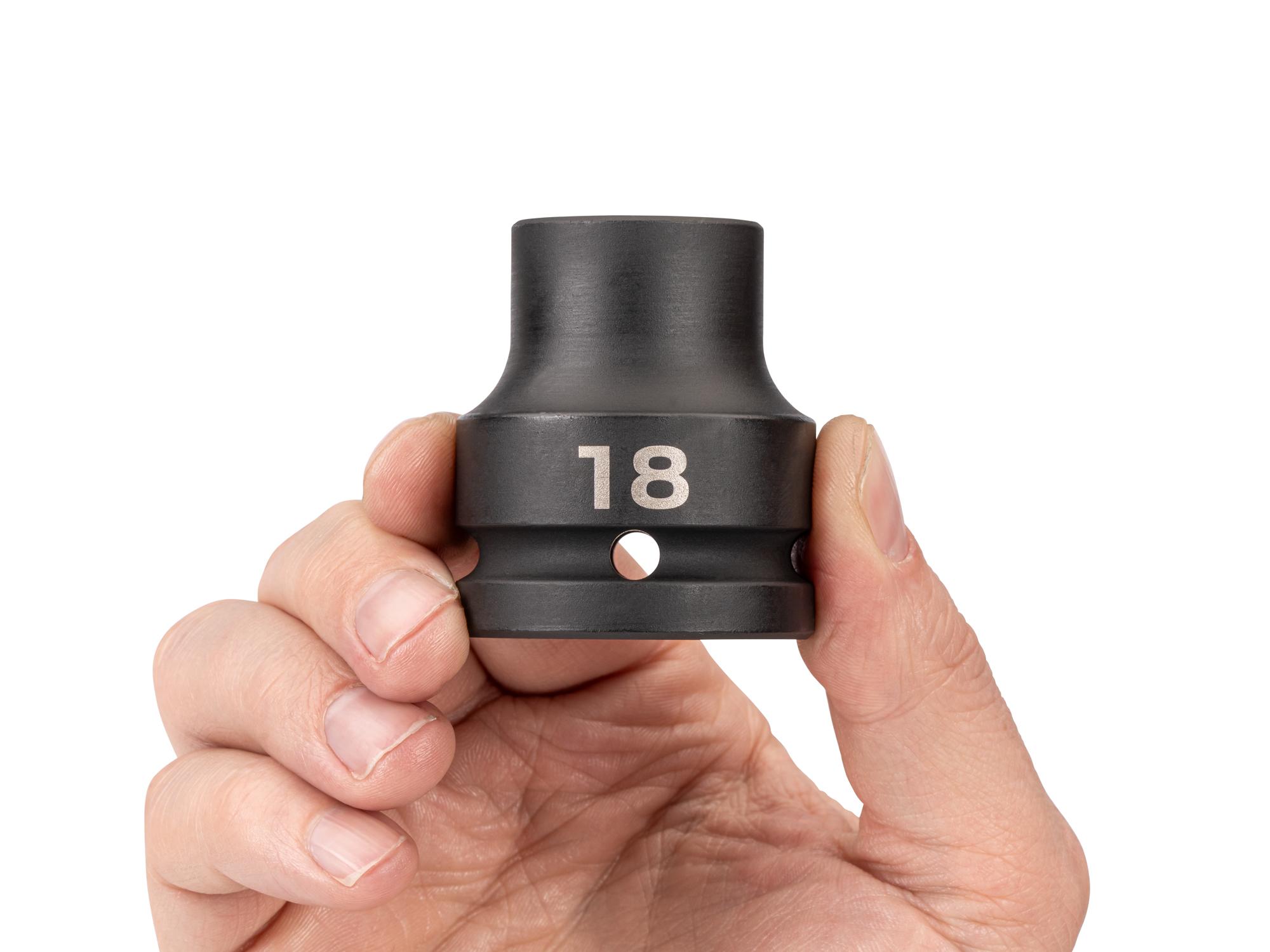 Person holding Tekton impact drive 6-point socket. Item #SID32118