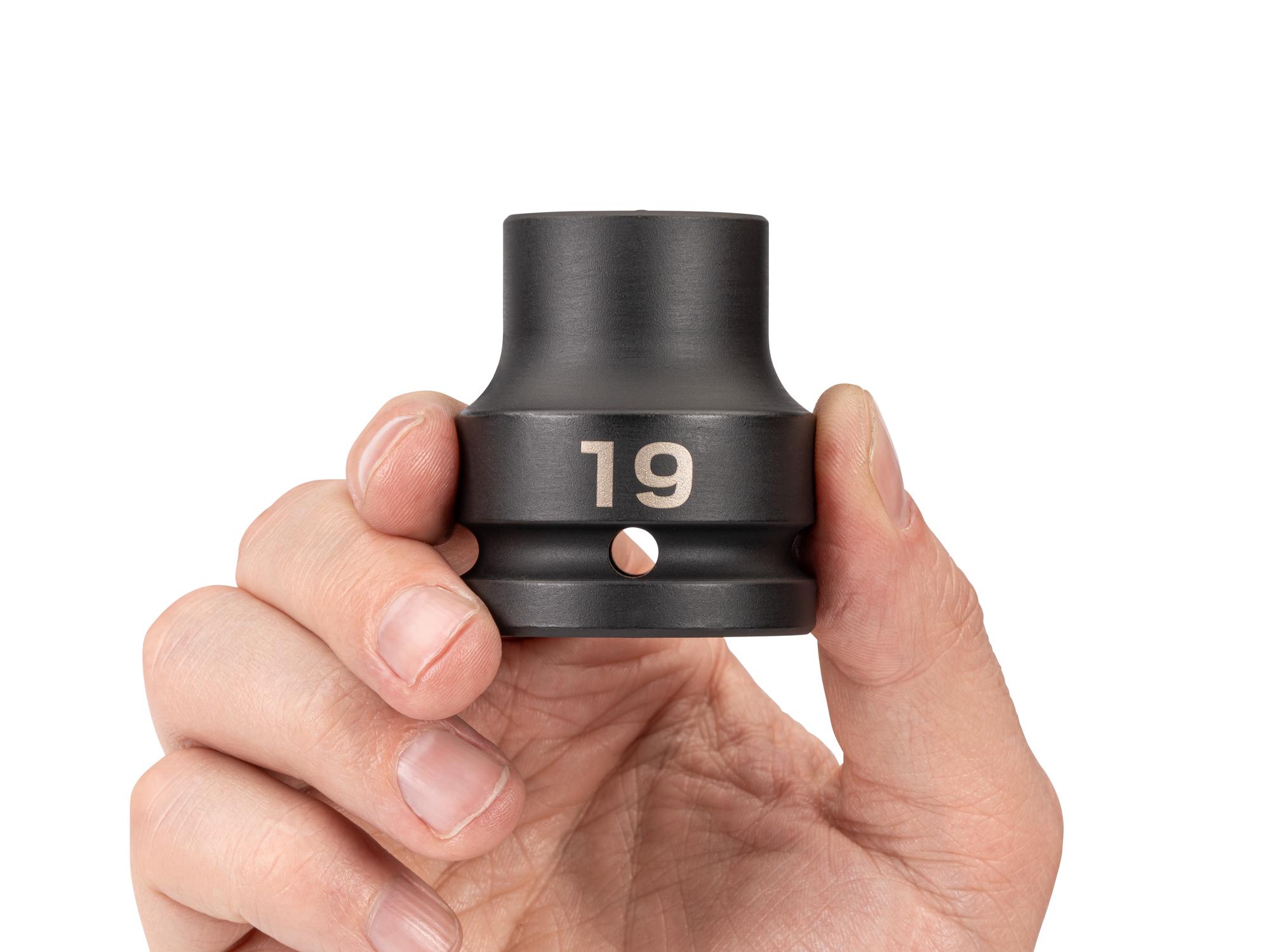 Person holding Tekton impact drive 6-point socket. Item #SID32119