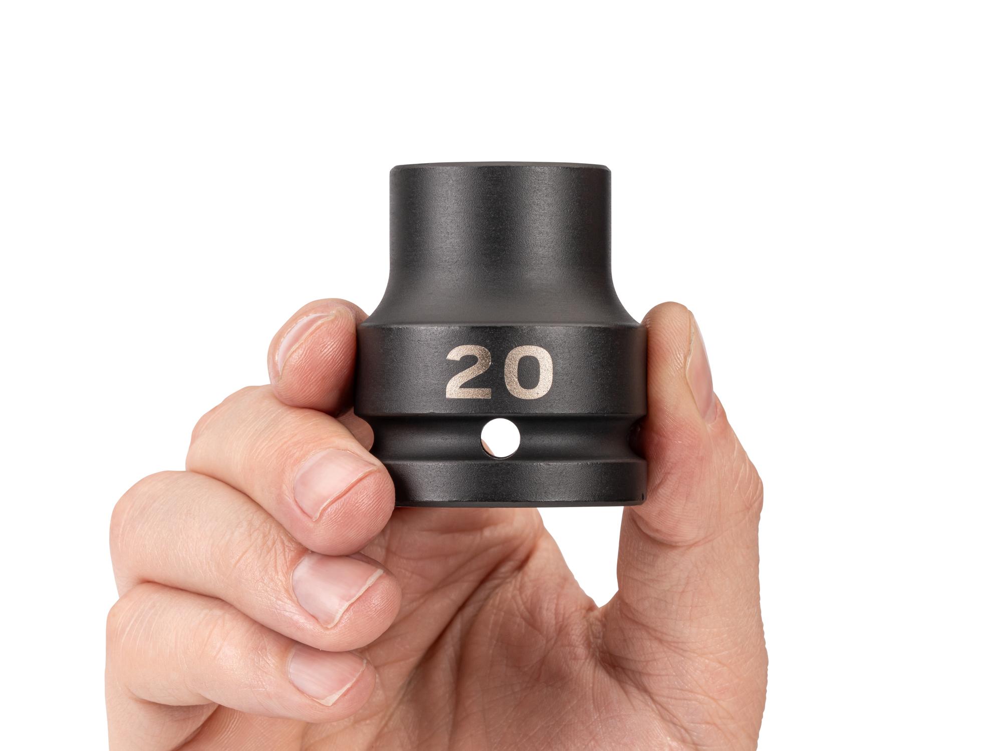 Person holding Tekton impact drive 6-point socket. Item #SID32120
