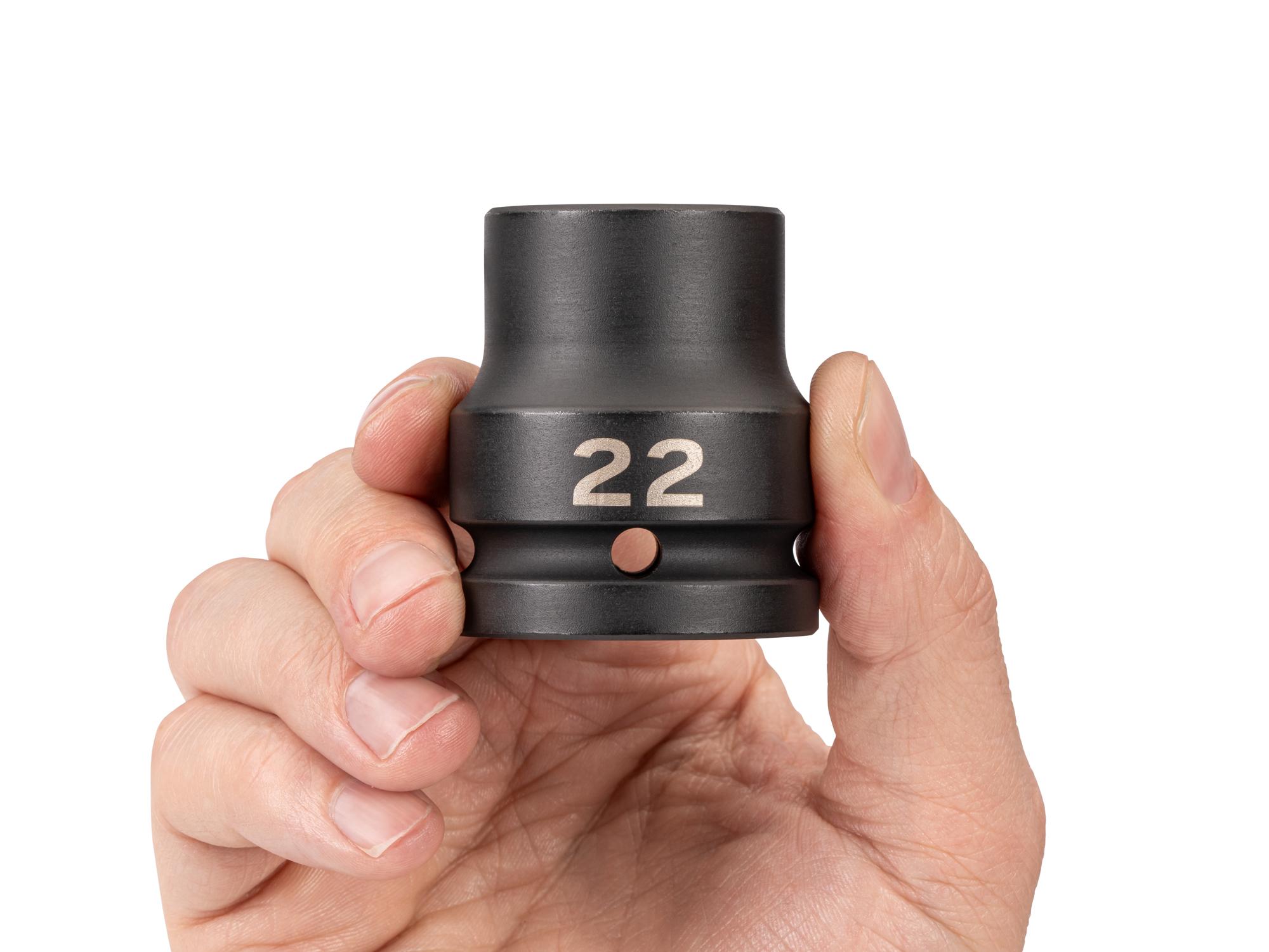 Person holding Tekton impact drive 6-point socket. Item #SID32122