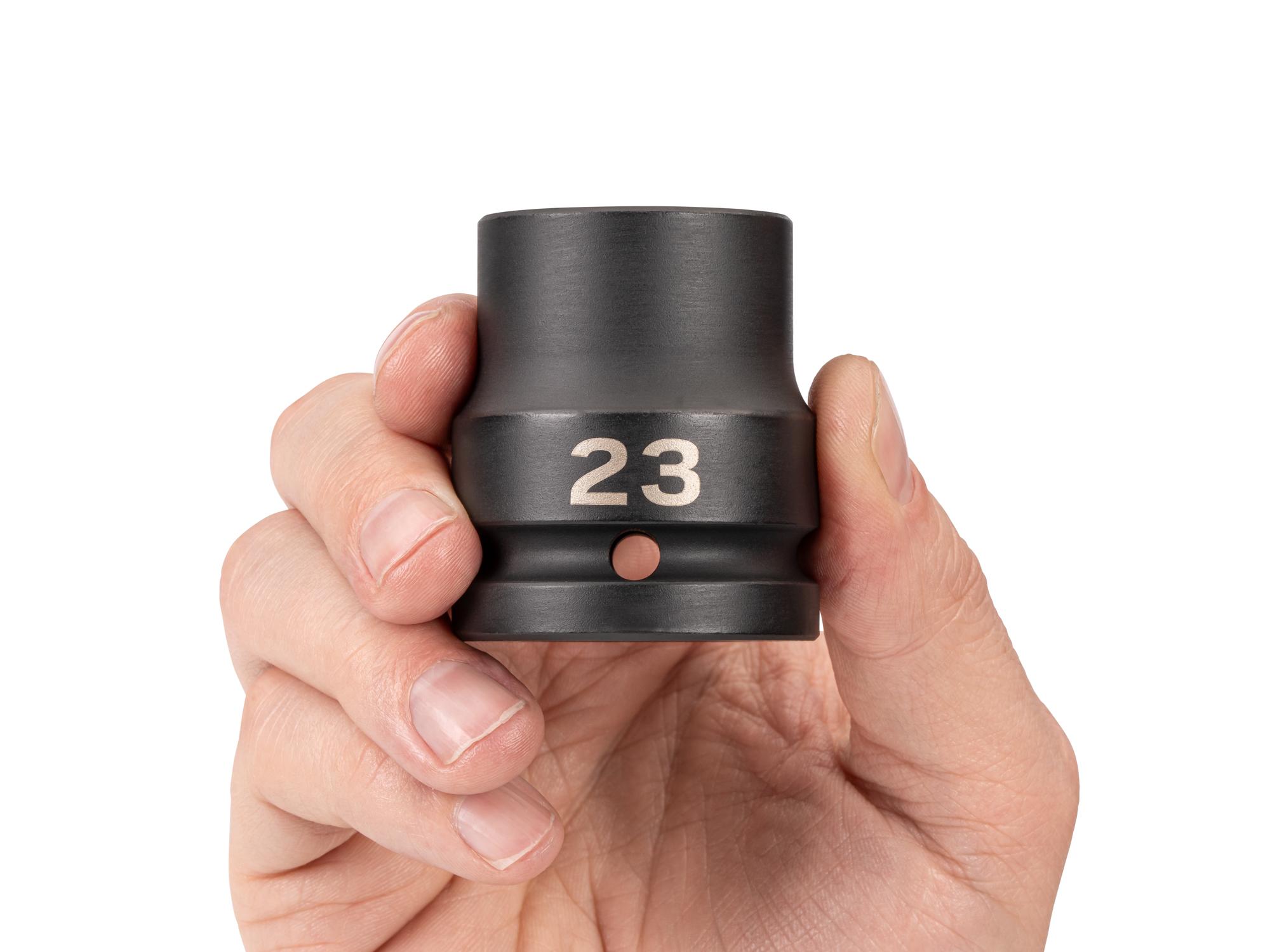 Person holding Tekton impact drive 6-point socket. Item #SID32123